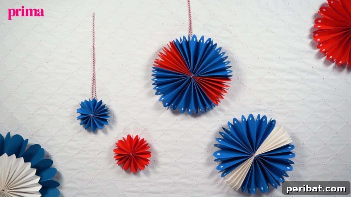 24 Creative DIY Paper Fan Projects 14 DIY paper fan decorations, perfect for adding sparkle and shine to coronation celebrations with simple materials like paper, scissors, glue, and twine.
