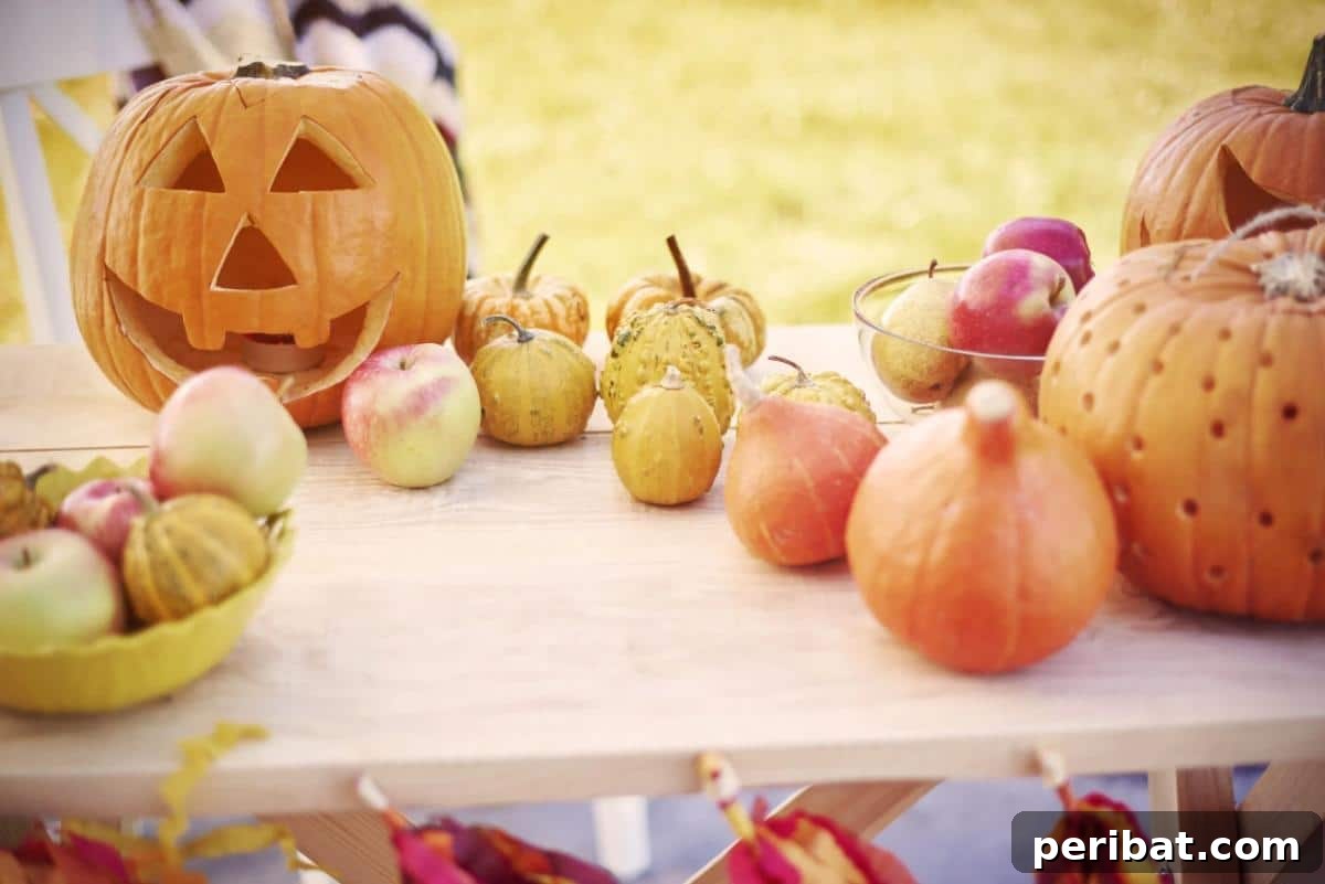 20 Stunning DIY Candle Label Designs to Personalize Your Creations 16 Pumpkins and apples on the table.