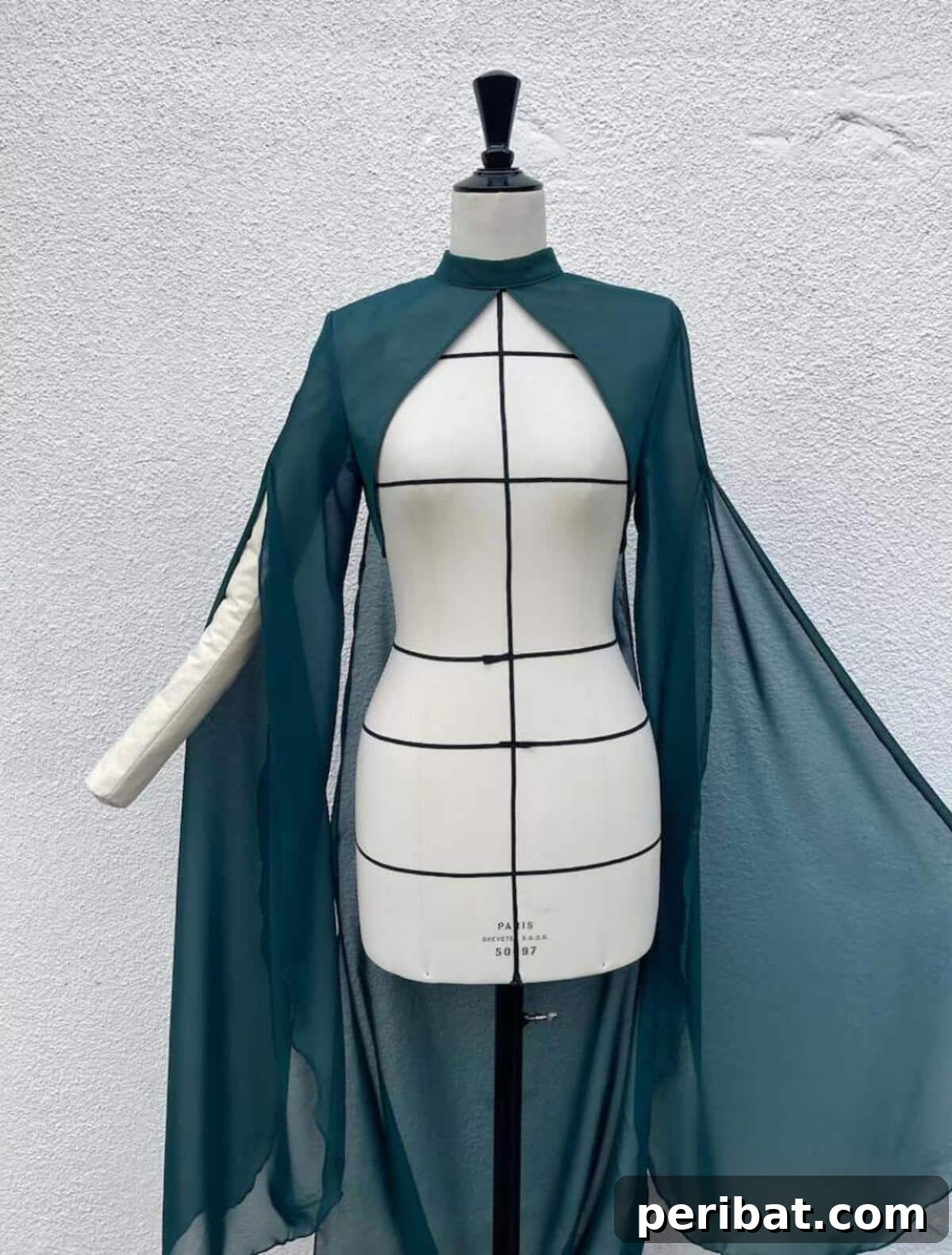 Enchanting Stitches: 20 Magical Sewing Designs 19 Elven Cloak, showing a graceful, flowing design.