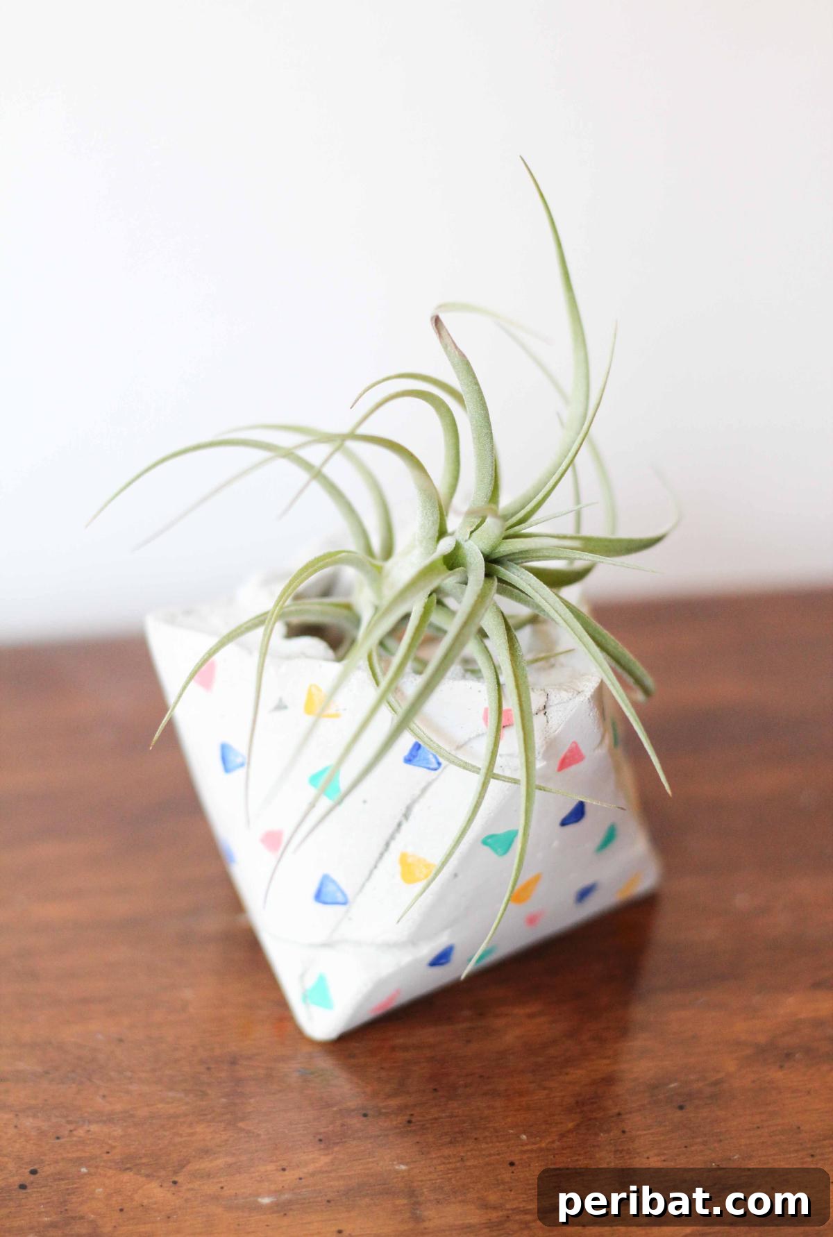 23 Modern Concrete Planter & Vase Projects 18 DIY Geometric Cement Planter, a unique and eye-catching piece for modern interior decor.