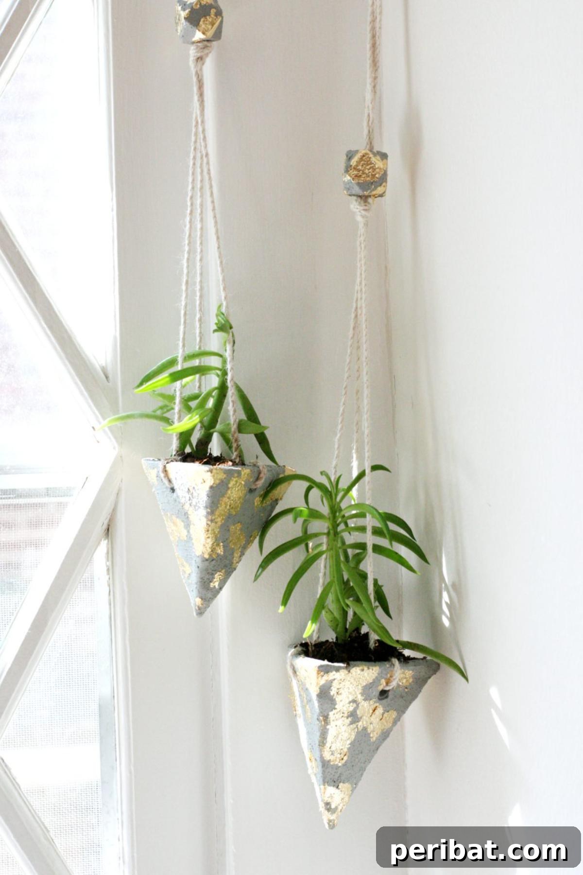 23 Modern Concrete Planter & Vase Projects 20 DIY Triangular Hanging Cement Planters, a geometric and rugged design with contemporary appeal.