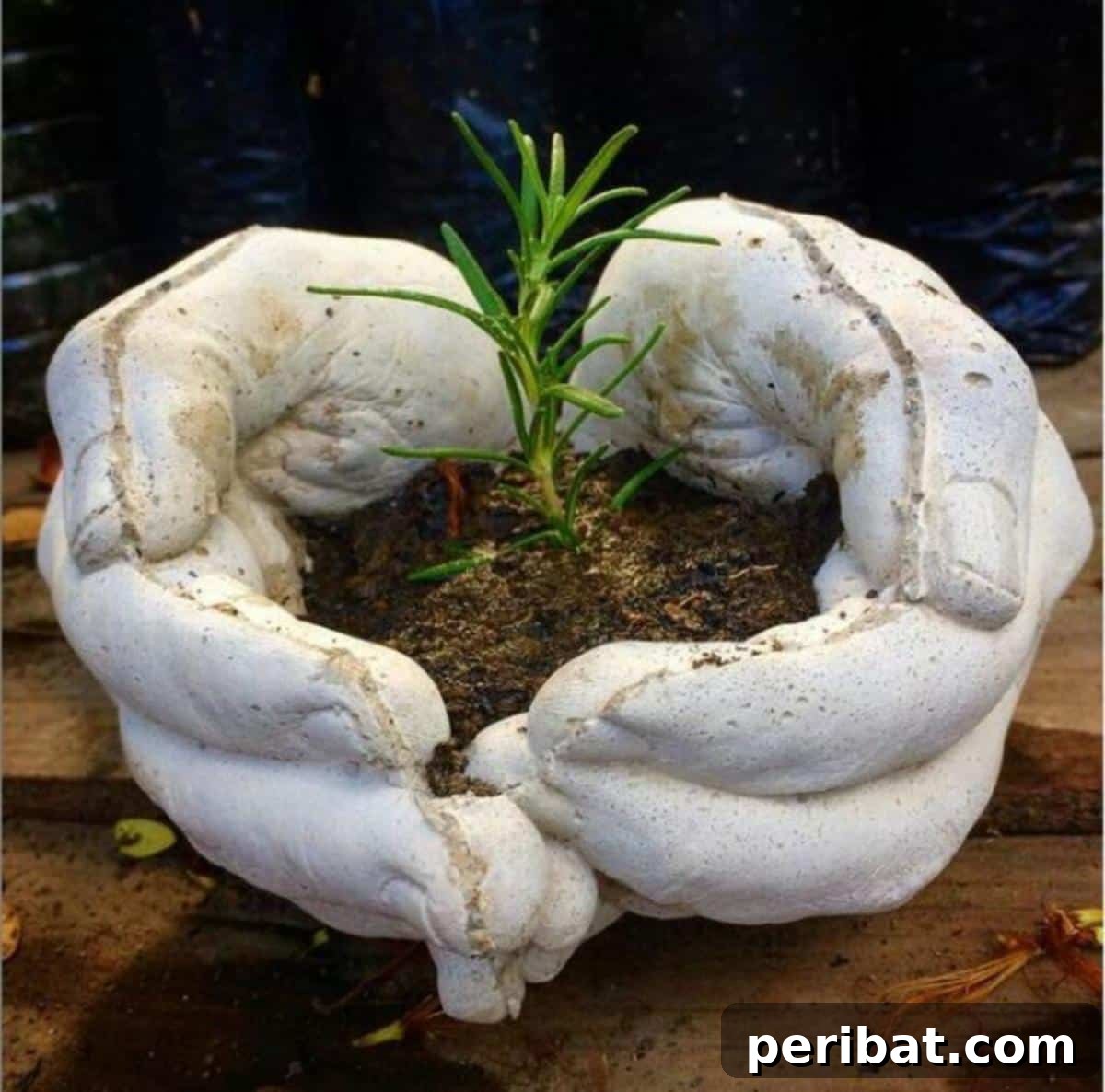 23 Modern Concrete Planter & Vase Projects 3 DIY Hand Concrete Planter showcasing a unique, sculptural hand-shaped design for indoor or outdoor decor.