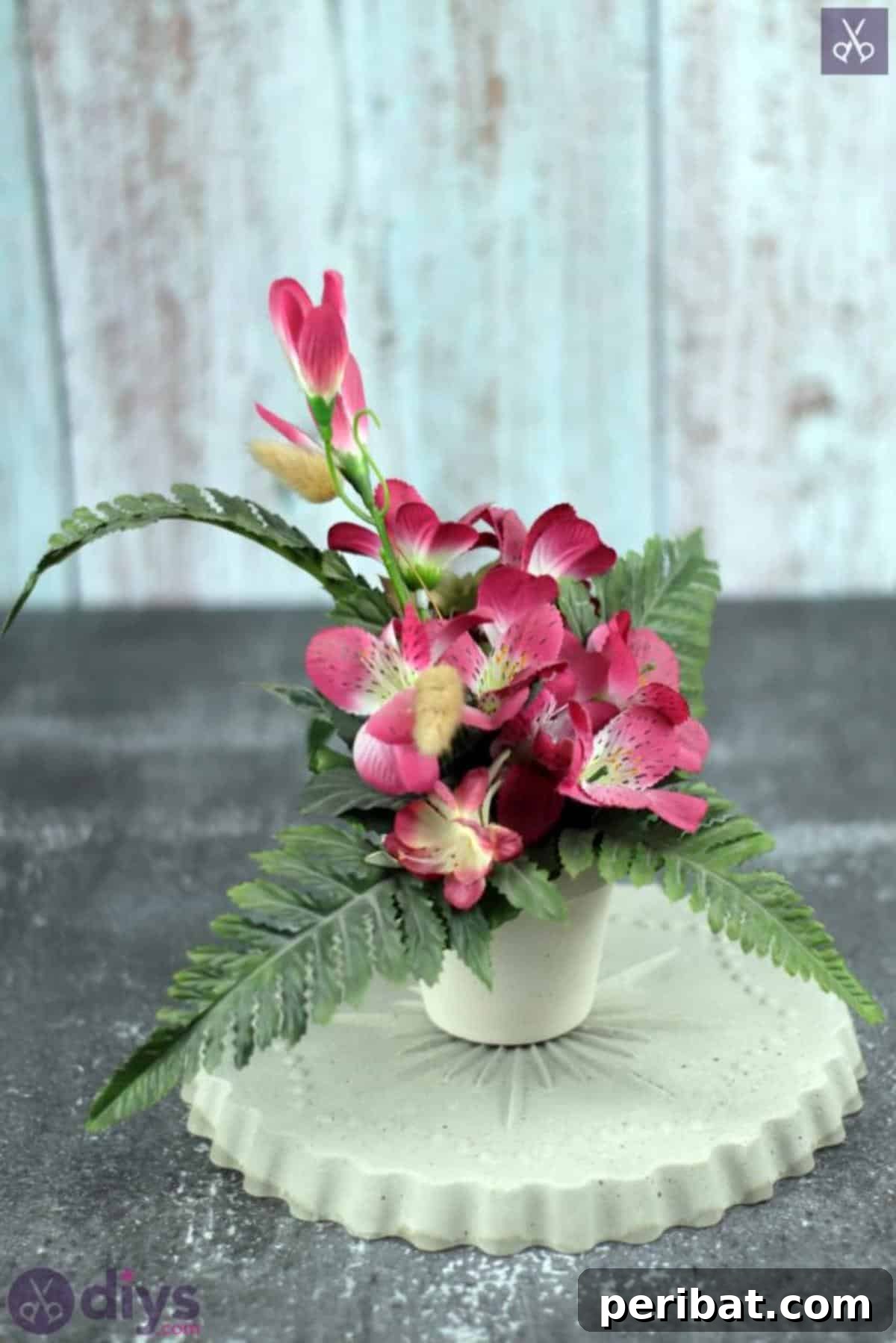 23 Modern Concrete Planter & Vase Projects 21 DIY Flower Stand Concrete Planter, featuring a geometric design and sturdy material for a minimalist decor piece.