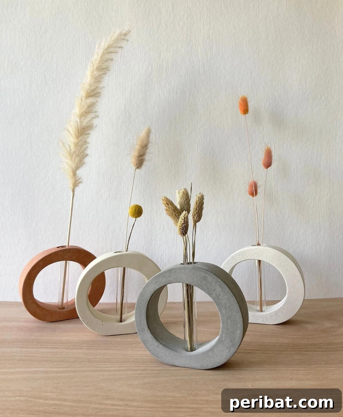 23 Modern Concrete Planter & Vase Projects 22 Circular Small Test Tube Concrete Planters, offering a unique design and texture for impactful visual appeal.