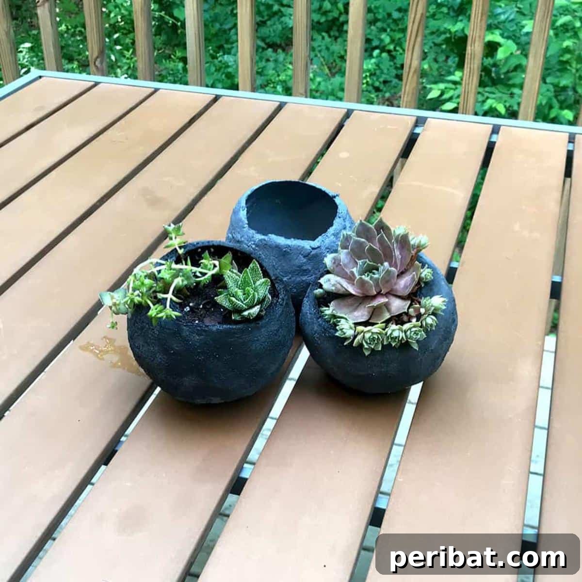 23 Modern Concrete Planter & Vase Projects 10 DIY Mini Pigmented Balloon Cement Planters, featuring round shapes and rough textures with added color for a modern look.