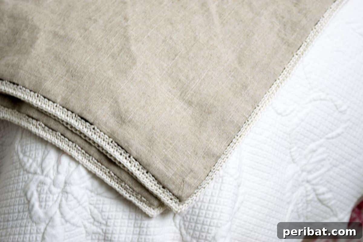 32 Cozy DIY Throw Blanket Ideas 11 DIY Simple Linen Throw With A Crocheted Edge