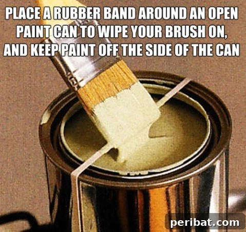 250 Smart Life Hacks to Simplify Your Life 182 Rubber band on open paint can for brush wiping