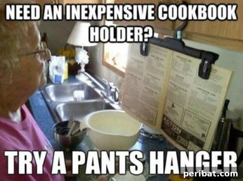 250 Smart Life Hacks to Simplify Your Life 212 Cookbook holder from a pants hanger