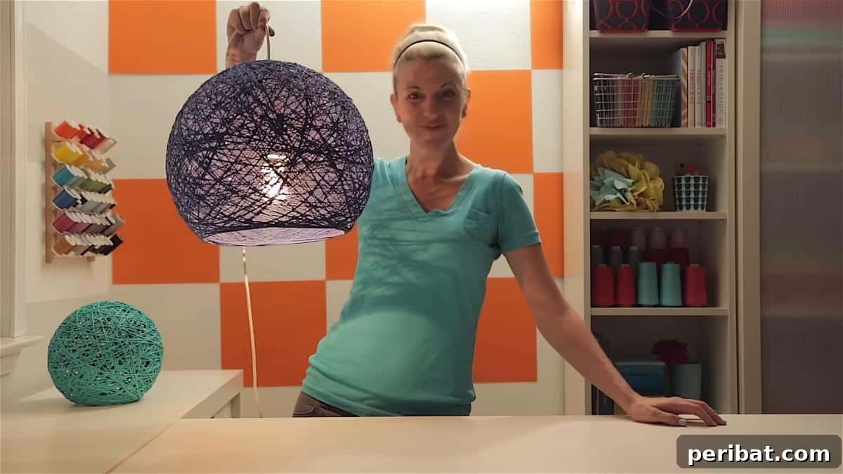 50 Creative DIY Lampshade Makeovers 4 DIY Yarn Globe Lampshade
