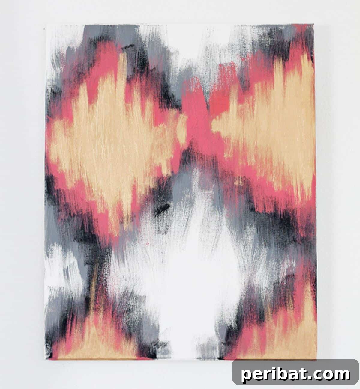43 Easy DIY Canvas Art Projects for Stunning Home Decor 11 DIY Painted Ikat Art displaying a vibrant, patterned canvas inspired by traditional Ikat weaving.