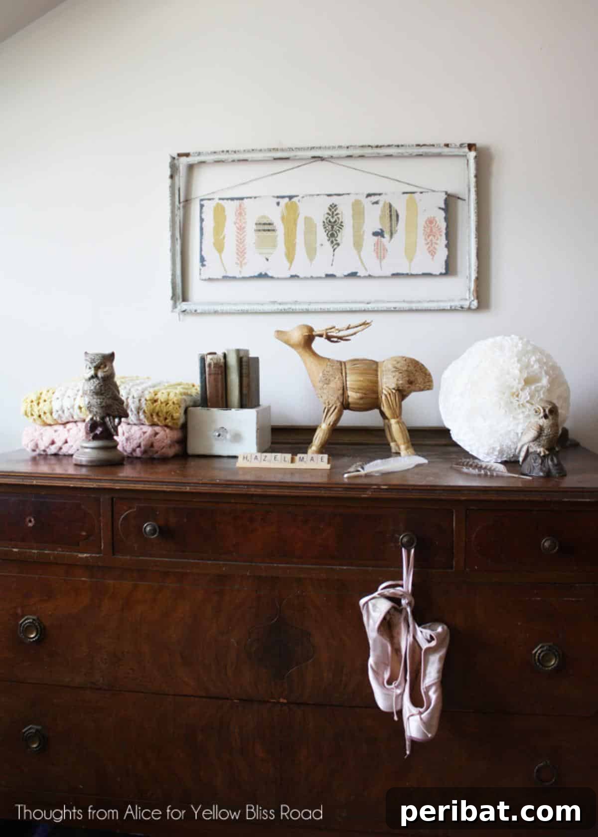 43 Easy DIY Canvas Art Projects for Stunning Home Decor 19 DIY Wallpaper Feather Art on Canvas featuring intricately cut feather shapes from patterned wallpaper.