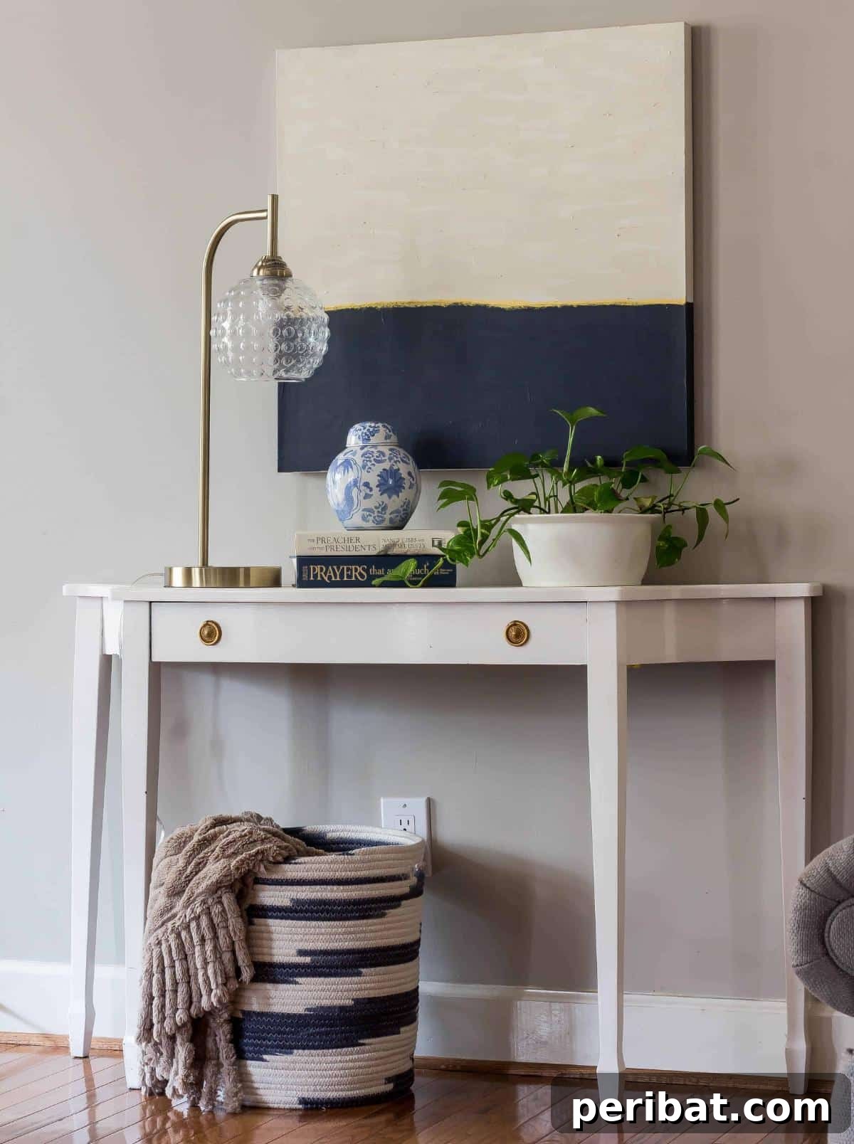 43 Easy DIY Canvas Art Projects for Stunning Home Decor 21 DIY Art by Painting Over A Thrifted Canvas showing a modern abstract design covering an older painting.
