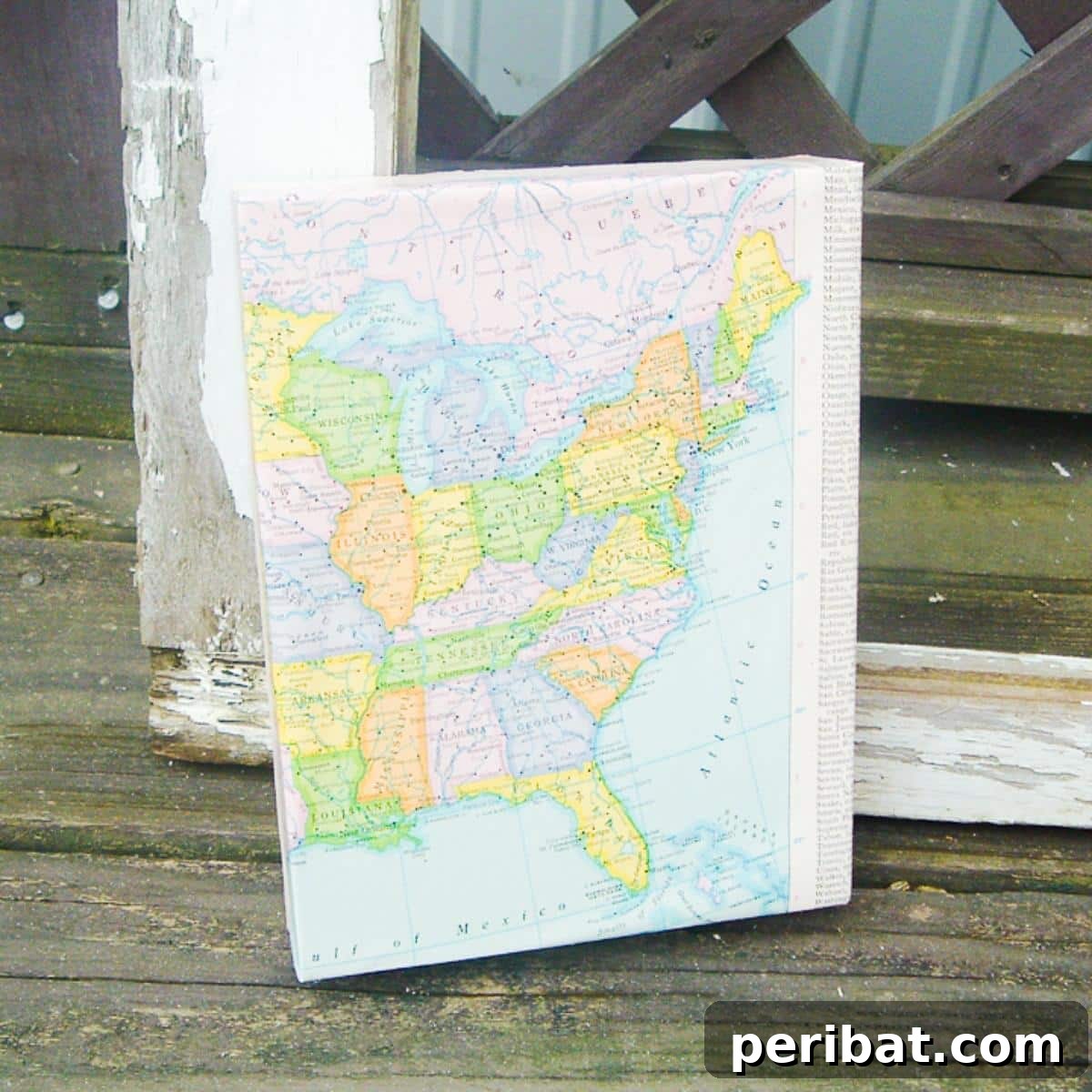 43 Easy DIY Canvas Art Projects for Stunning Home Decor 33 DIY Canvas Wall Map featuring a vintage-style world map stretched over a canvas frame.