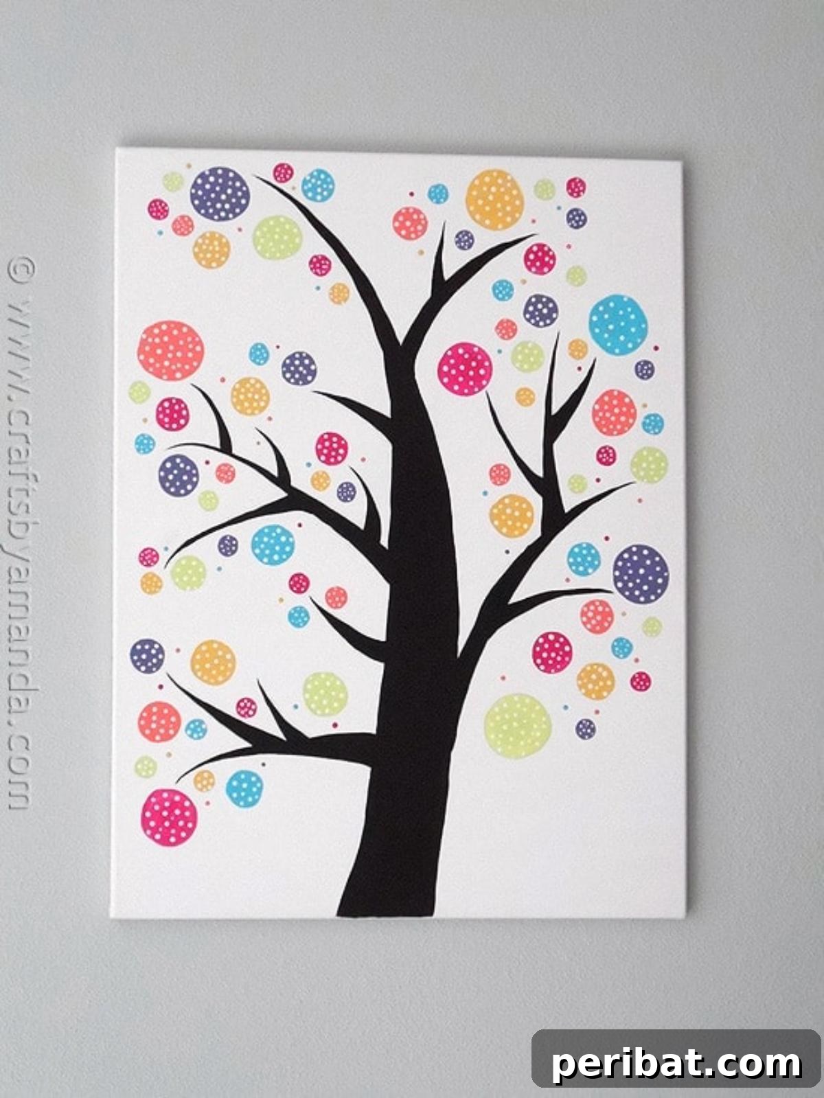 43 Easy DIY Canvas Art Projects for Stunning Home Decor 34 Polka Dot Circle Tree Wall Art featuring a whimsical tree design made of colorful polka dots.