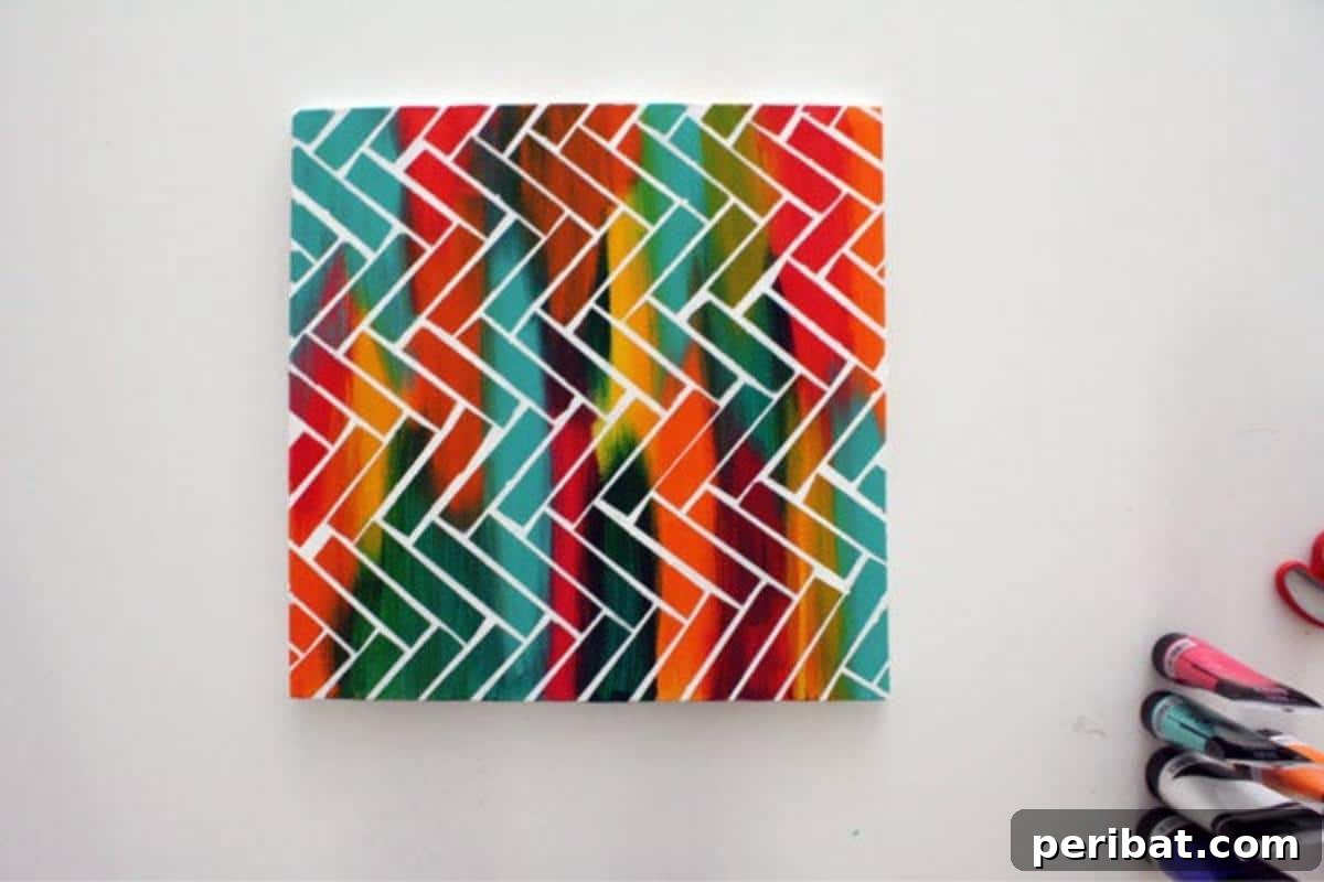 43 Easy DIY Canvas Art Projects for Stunning Home Decor 39 Easy DIY Custom Canvas Art featuring a unique, personalized abstract design on a square canvas.