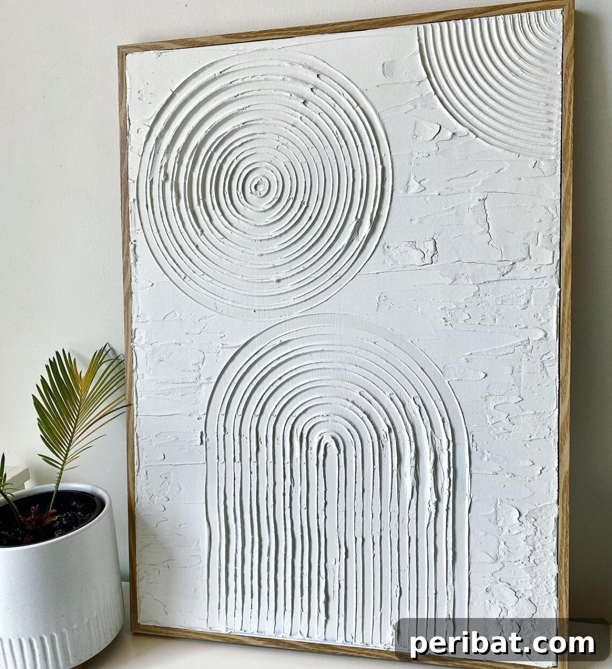 43 Easy DIY Canvas Art Projects for Stunning Home Decor 40 DIY Textured Art created with modeling paste, offering a sculptural and modern aesthetic.