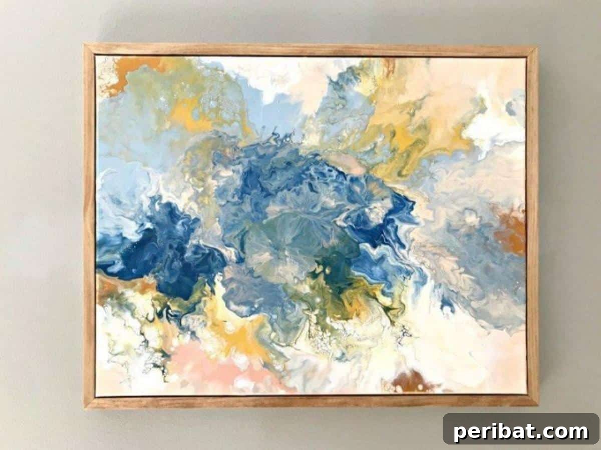 43 Easy DIY Canvas Art Projects for Stunning Home Decor 9 Super Easy DIY Acrylic Paint Pouring Wall Art showcasing vibrant, swirling colors creating a unique abstract pattern.