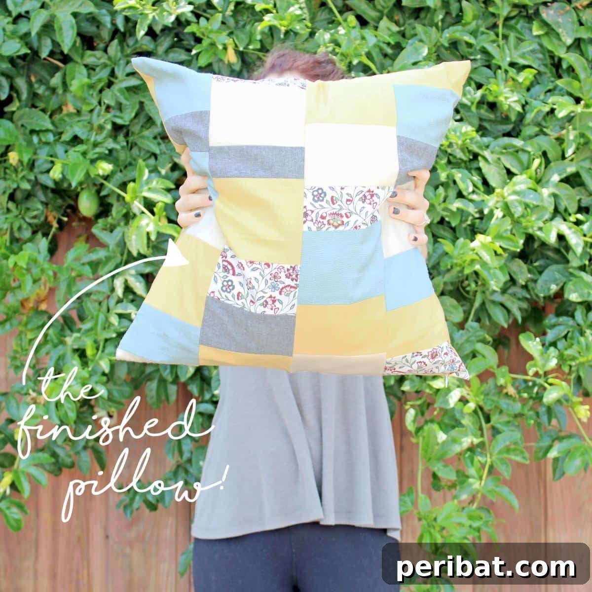 47 Inspiring DIY Throw Pillow Designs 26 A charming DIY scrap fabric pillow, featuring a patchwork design for an eco-friendly touch.
