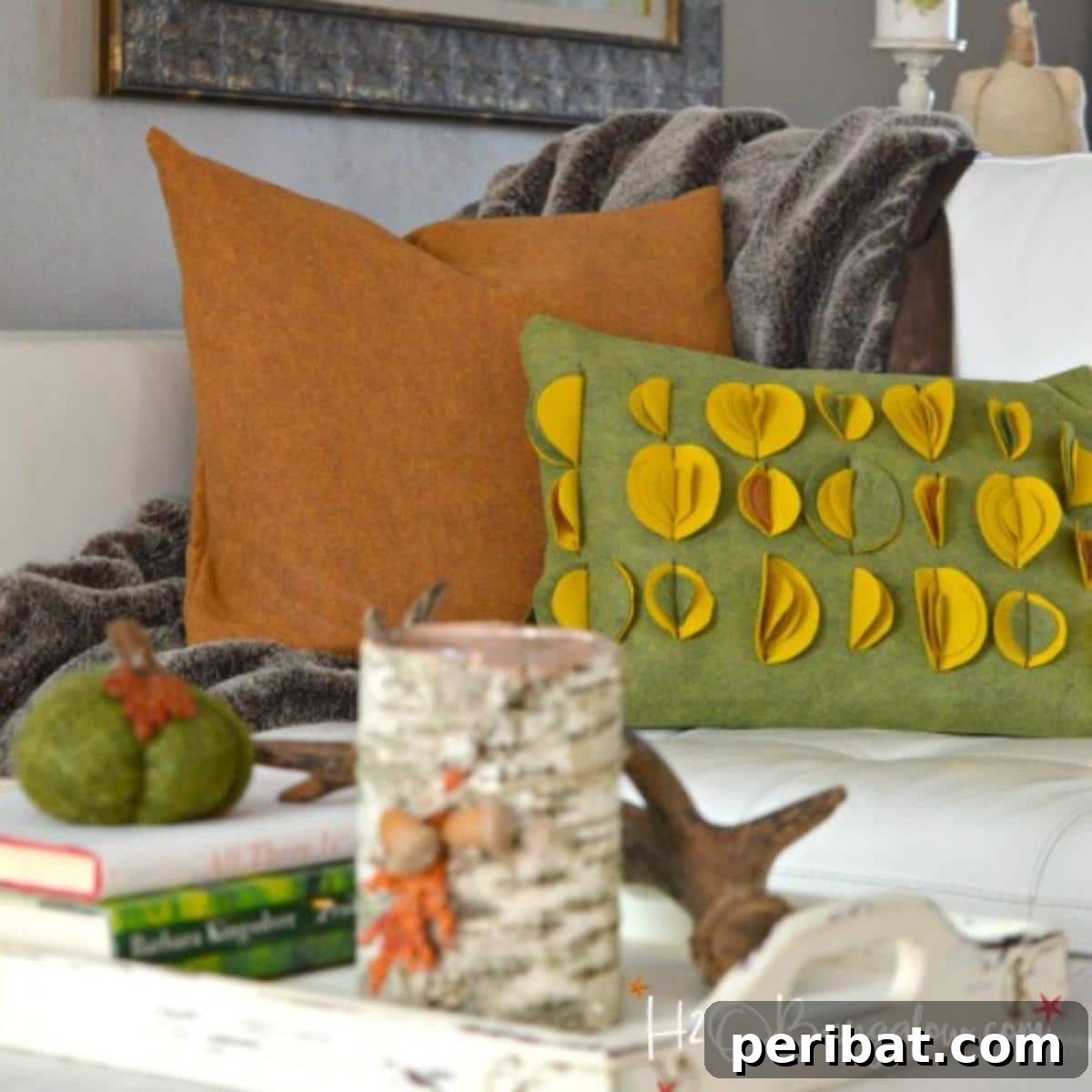 47 Inspiring DIY Throw Pillow Designs 39 A cozy fall DIY felted wool throw pillow, perfect for autumnal home decor.