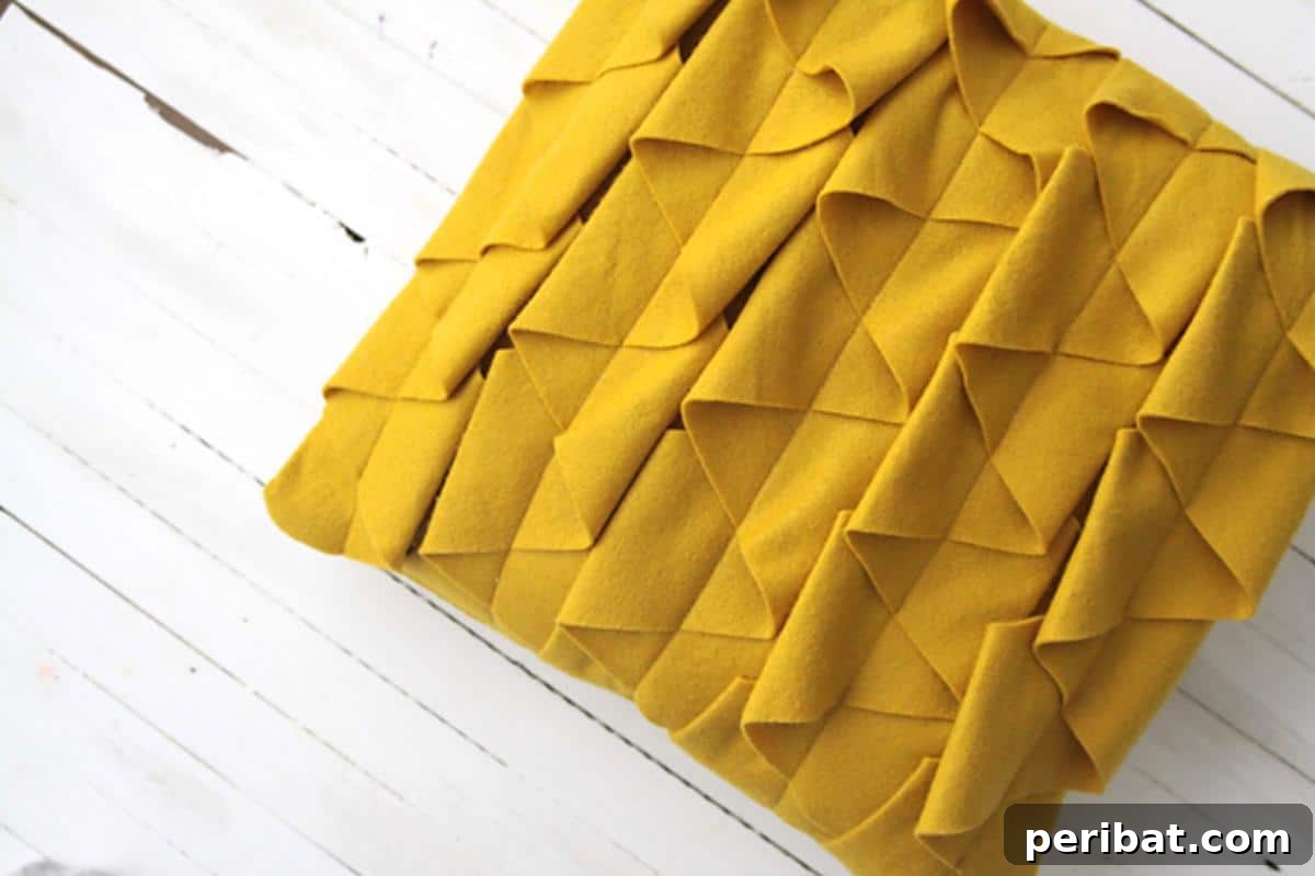 47 Inspiring DIY Throw Pillow Designs 10 A collection of beautifully sewn DIY decorative throw pillows with various patterns and textures.