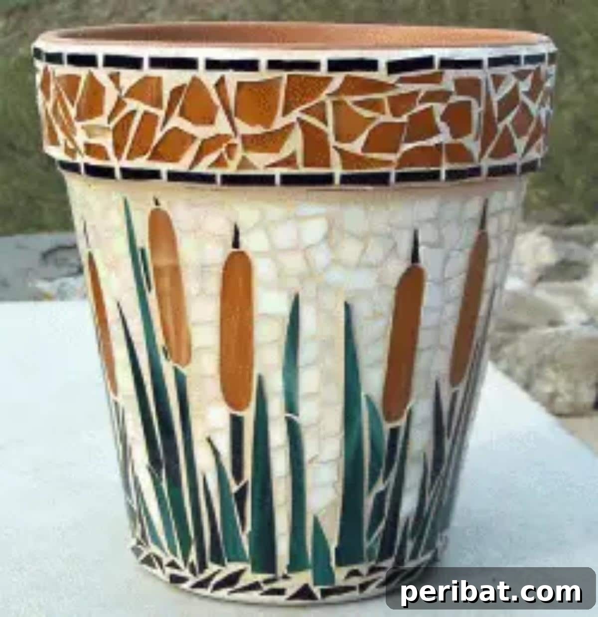 DIY mosaic flower pot.