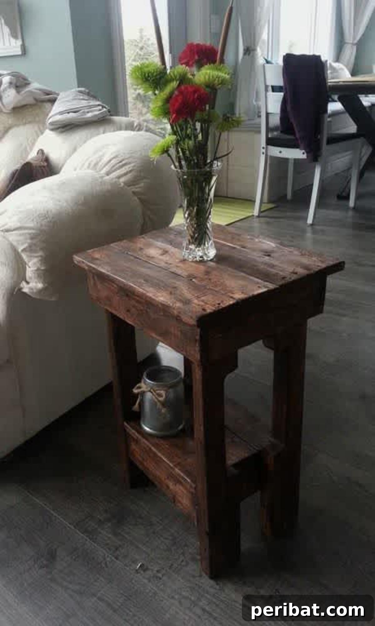 37 Simple and Stylish DIY End Tables 12 Quick and easy DIY end table made from repurposed wooden pallets, showcasing a minimalist and rustic design.