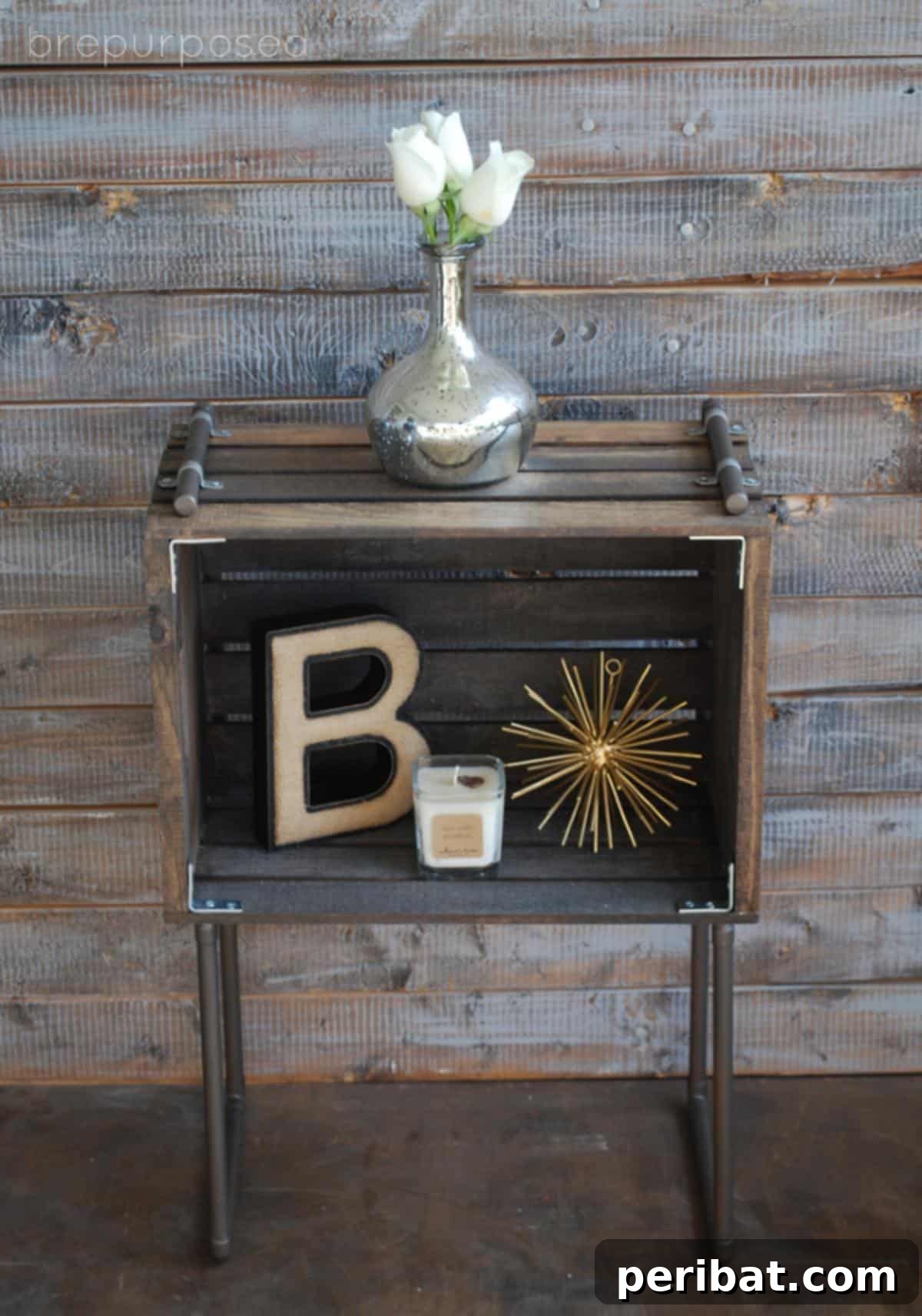 37 Simple and Stylish DIY End Tables 13 Stylish DIY industrial table crafted from wooden crates and metal pipes, offering robust storage and an edgy aesthetic.