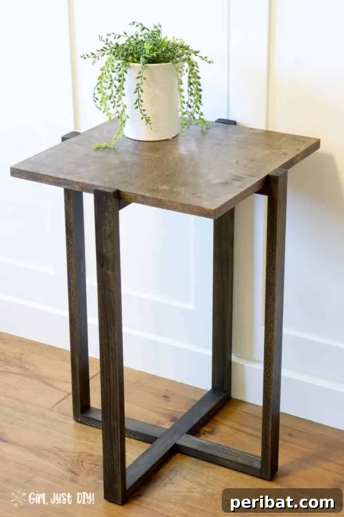 37 Simple and Stylish DIY End Tables 16 Stylish DIY modern end table with a minimalist design, clean lines, and a light wood finish.