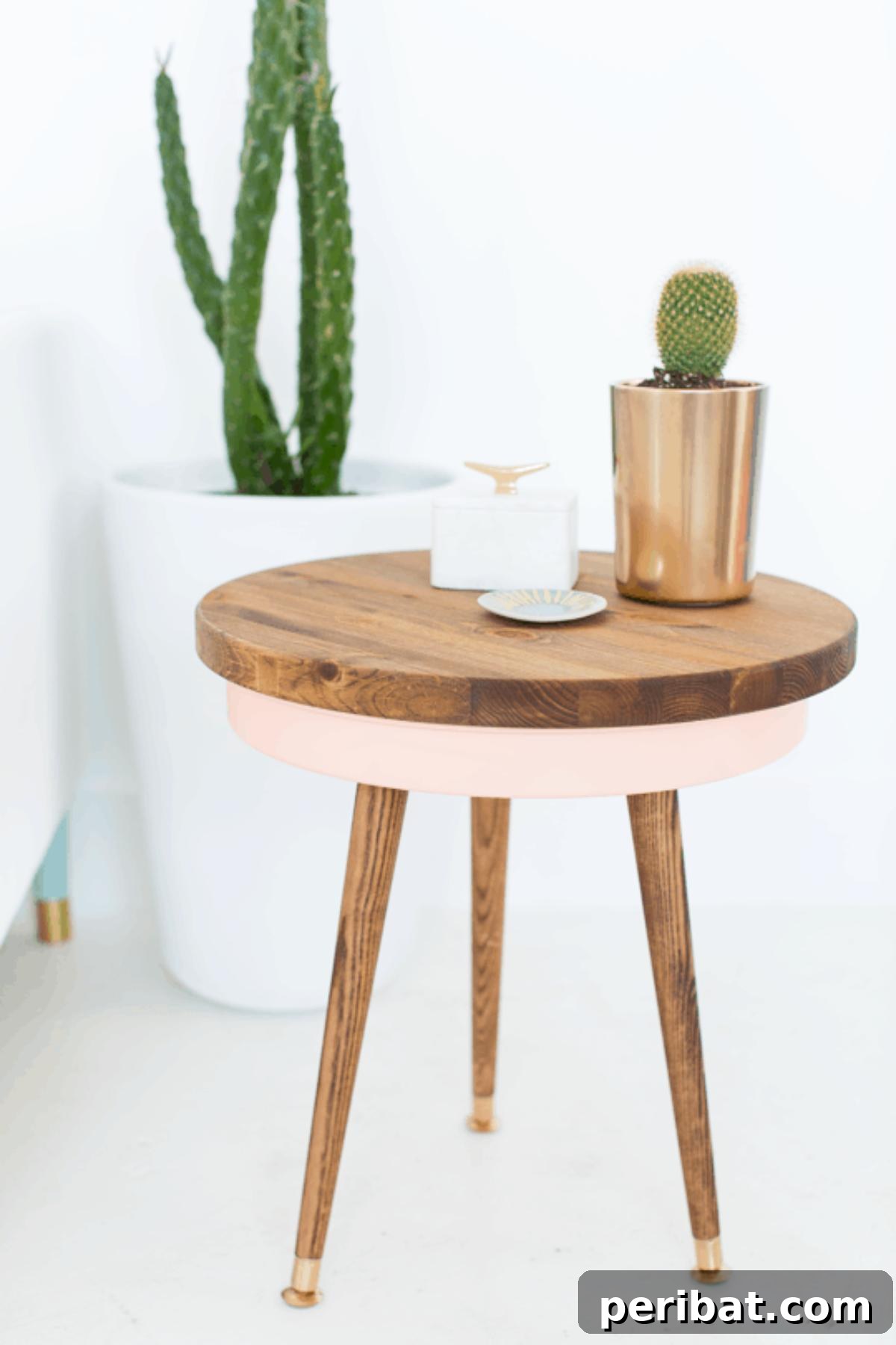 37 Simple and Stylish DIY End Tables 18 Stylish DIY Mid-Century Modern side table with a light wood finish and elegant tapered legs, perfect for minimalist decor.
