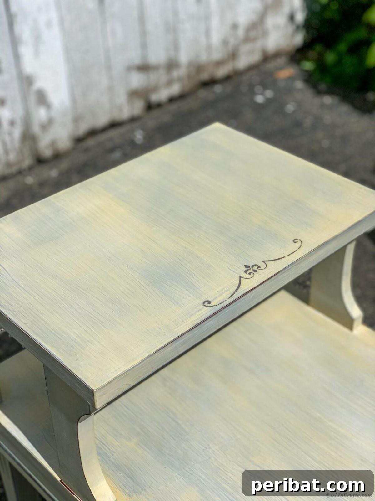 37 Simple and Stylish DIY End Tables 3 Transformed Mid-Century End Table with a fresh furniture makeover, showcasing a sleek and updated design and modern legs.