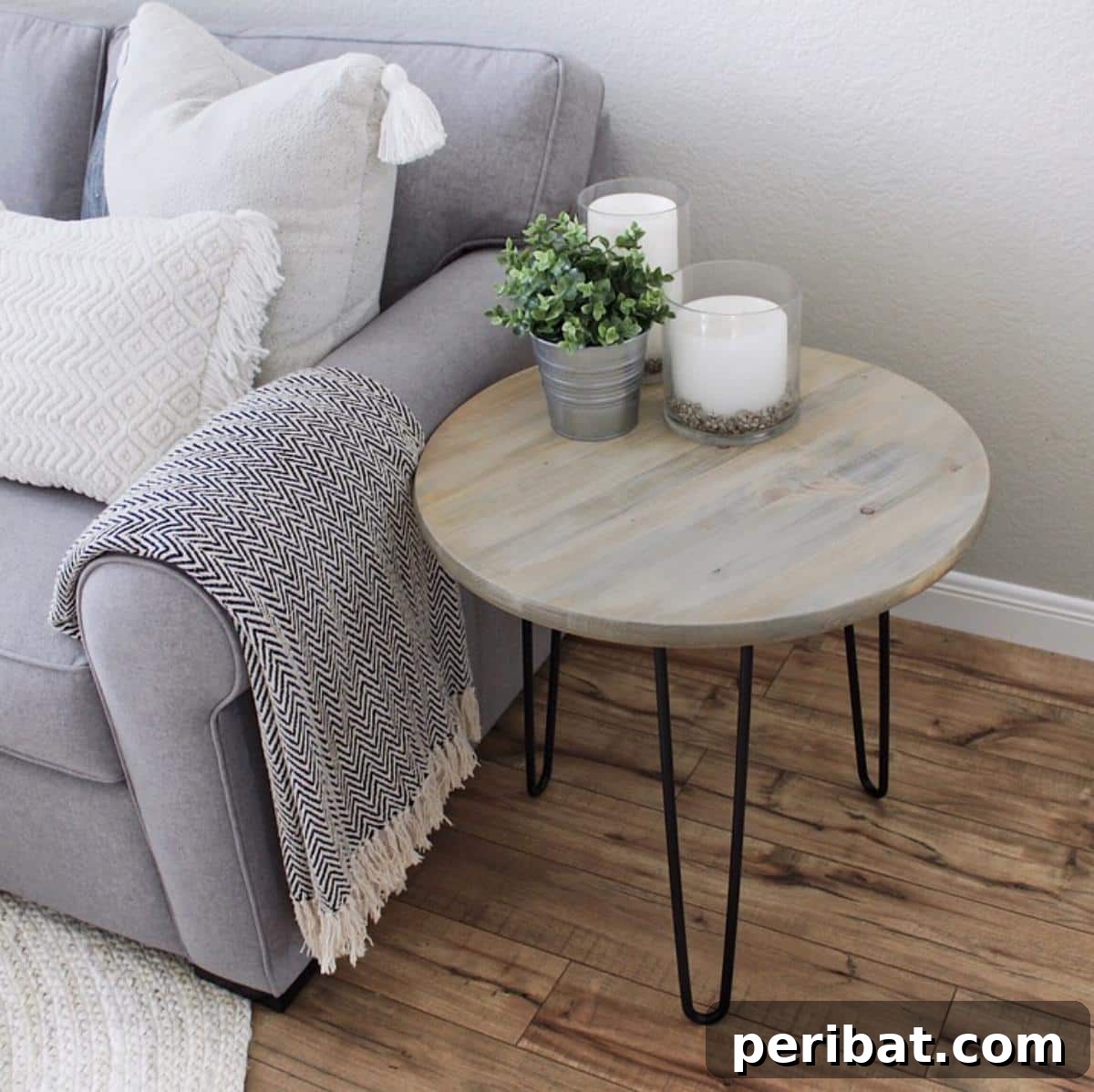 37 Simple and Stylish DIY End Tables 21 Sleek DIY hairpin table with a light wood top and modern metal hairpin legs, perfect for minimalist and contemporary interiors.