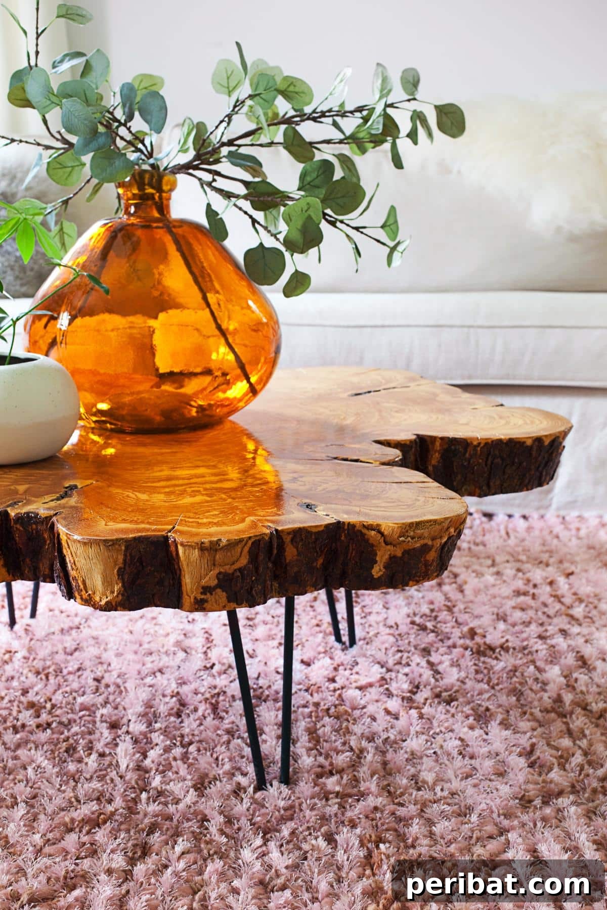 37 Simple and Stylish DIY End Tables 4 Beautiful live edge coffee table featuring a natural wood slab with its unique organic edges preserved.