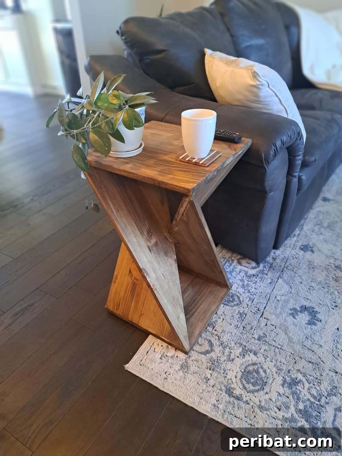 37 Simple and Stylish DIY End Tables 35 Versatile DIY side and end table, showcasing a modern design with practical proportions, suitable for various room layouts.