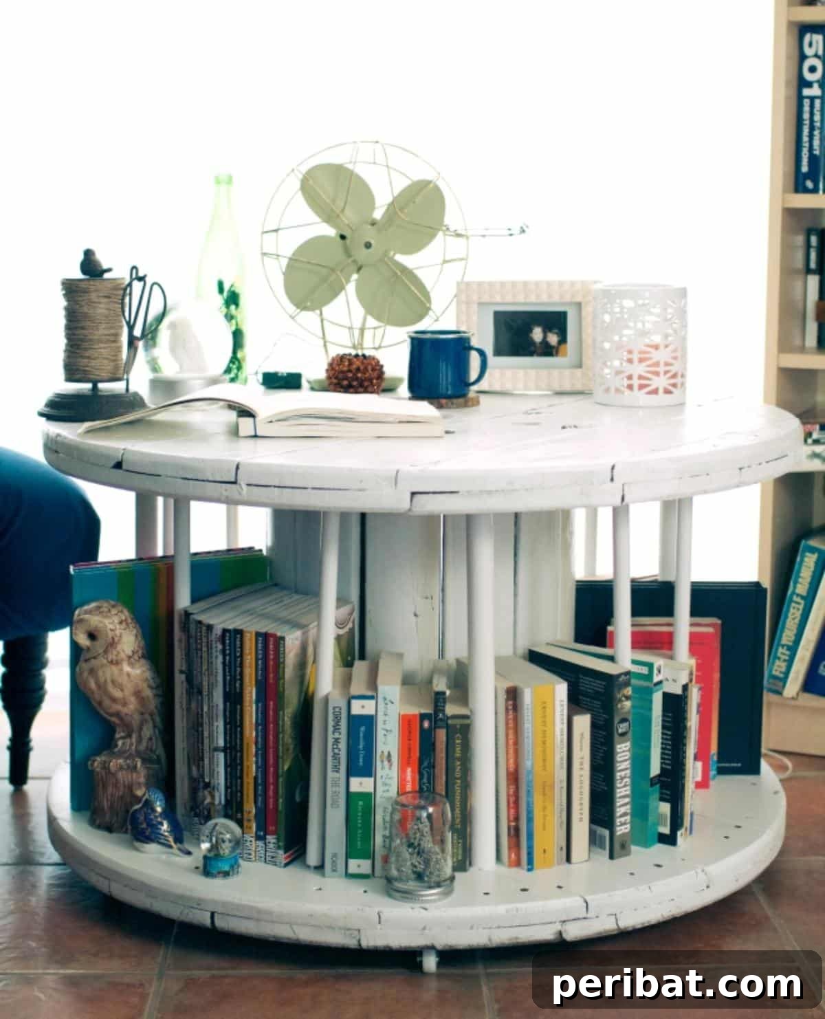 37 Simple and Stylish DIY End Tables 9 Creative DIY library table crafted from stacked antique books, forming a unique and literary-themed end table.