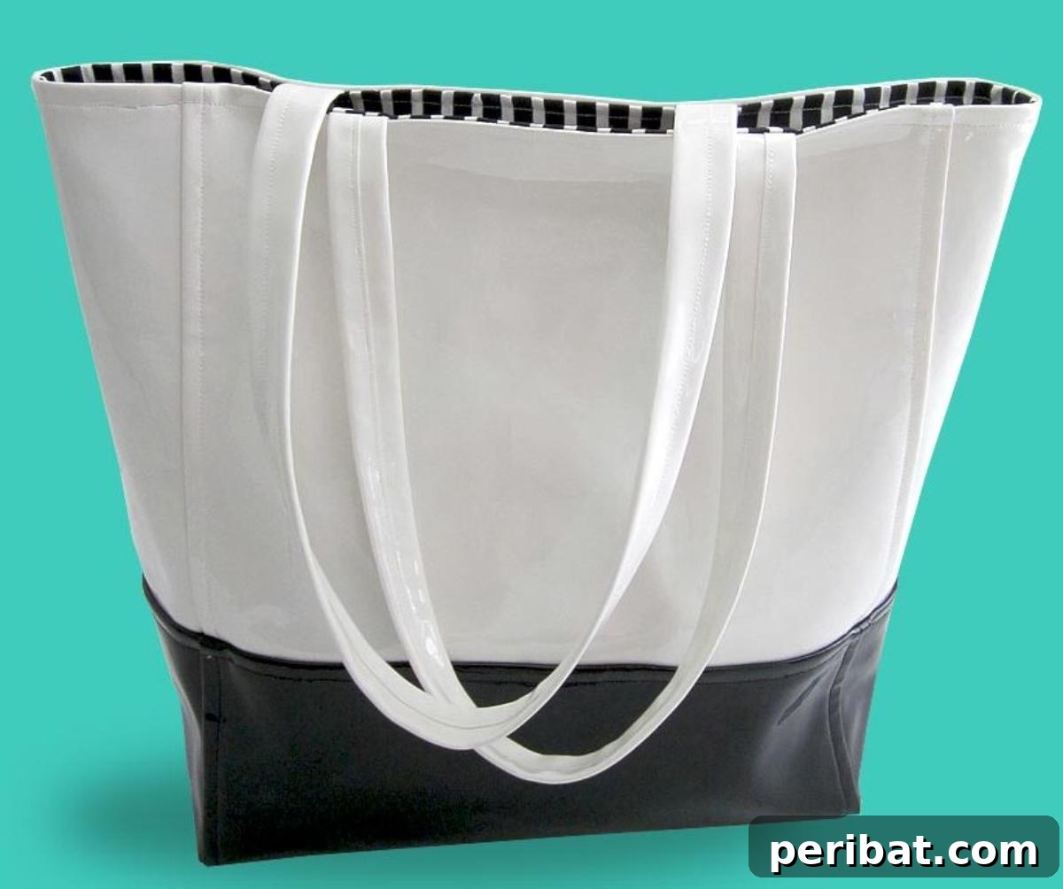 A chic Patent Leather Vinyl Color Block Tote, featuring a modern and sophisticated design with contrasting panels.