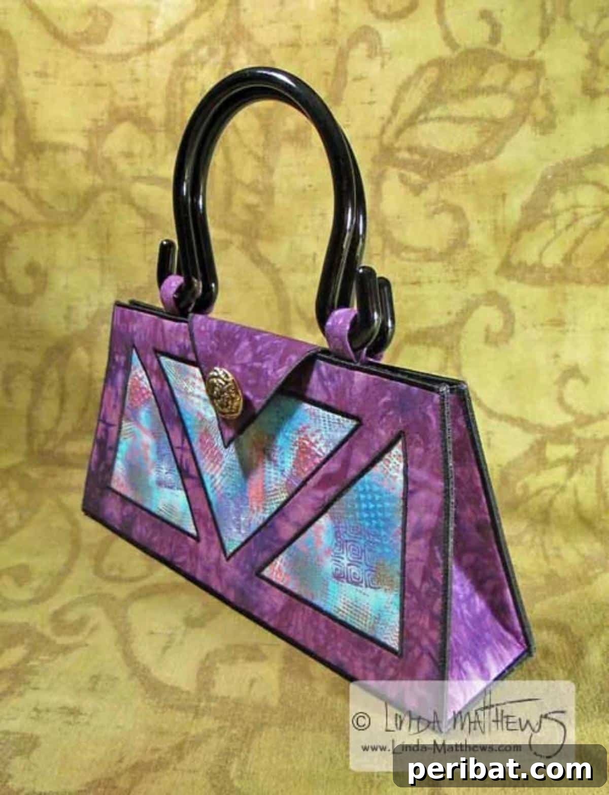 The chic and stylish Belita Bag, featuring a rigid structure and elegant design, suitable for any occasion.