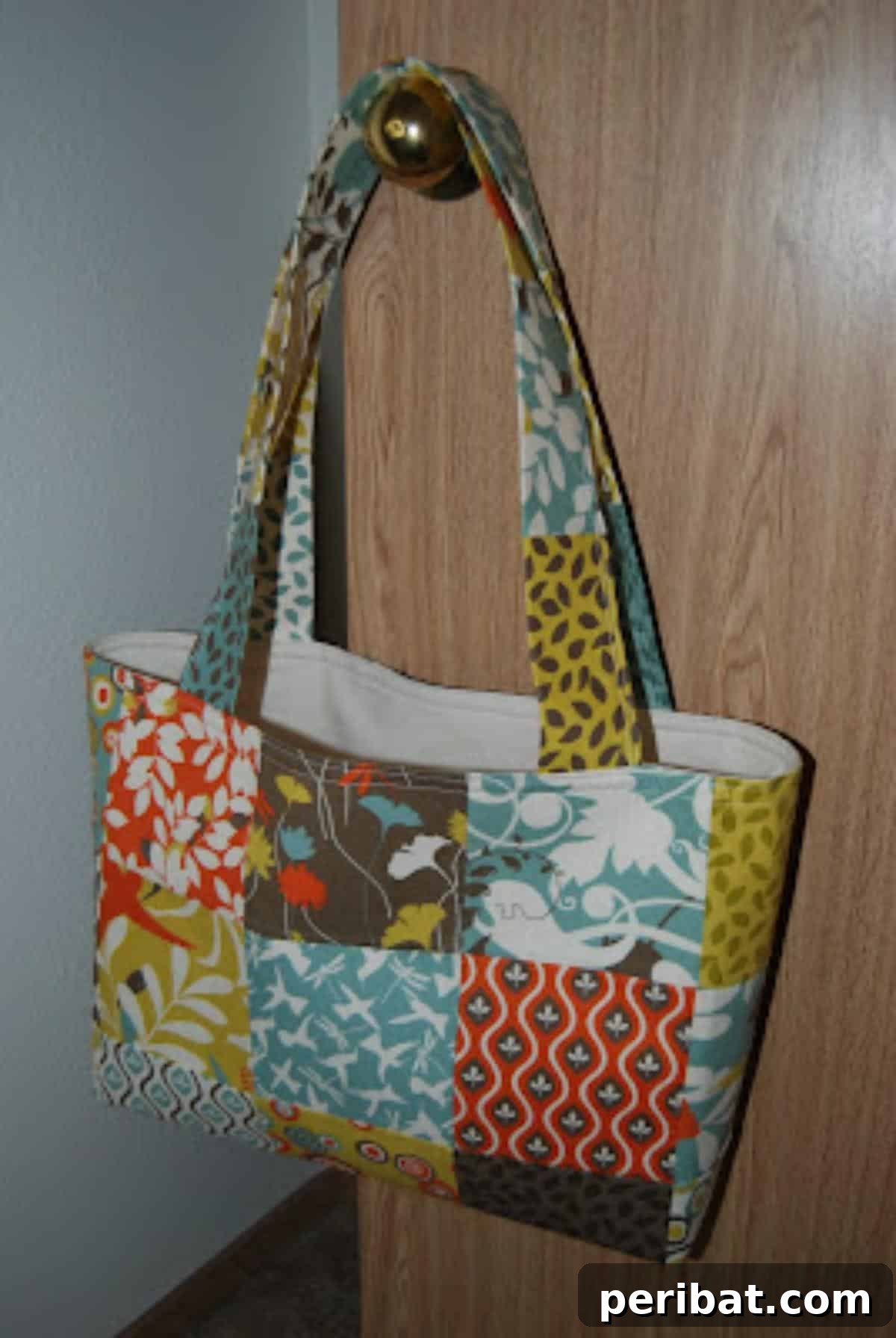 A beautiful Patchwork Shoulder Bag, resembling mosaic art and providing a creative way to use fabric scraps for a stunning accessory.