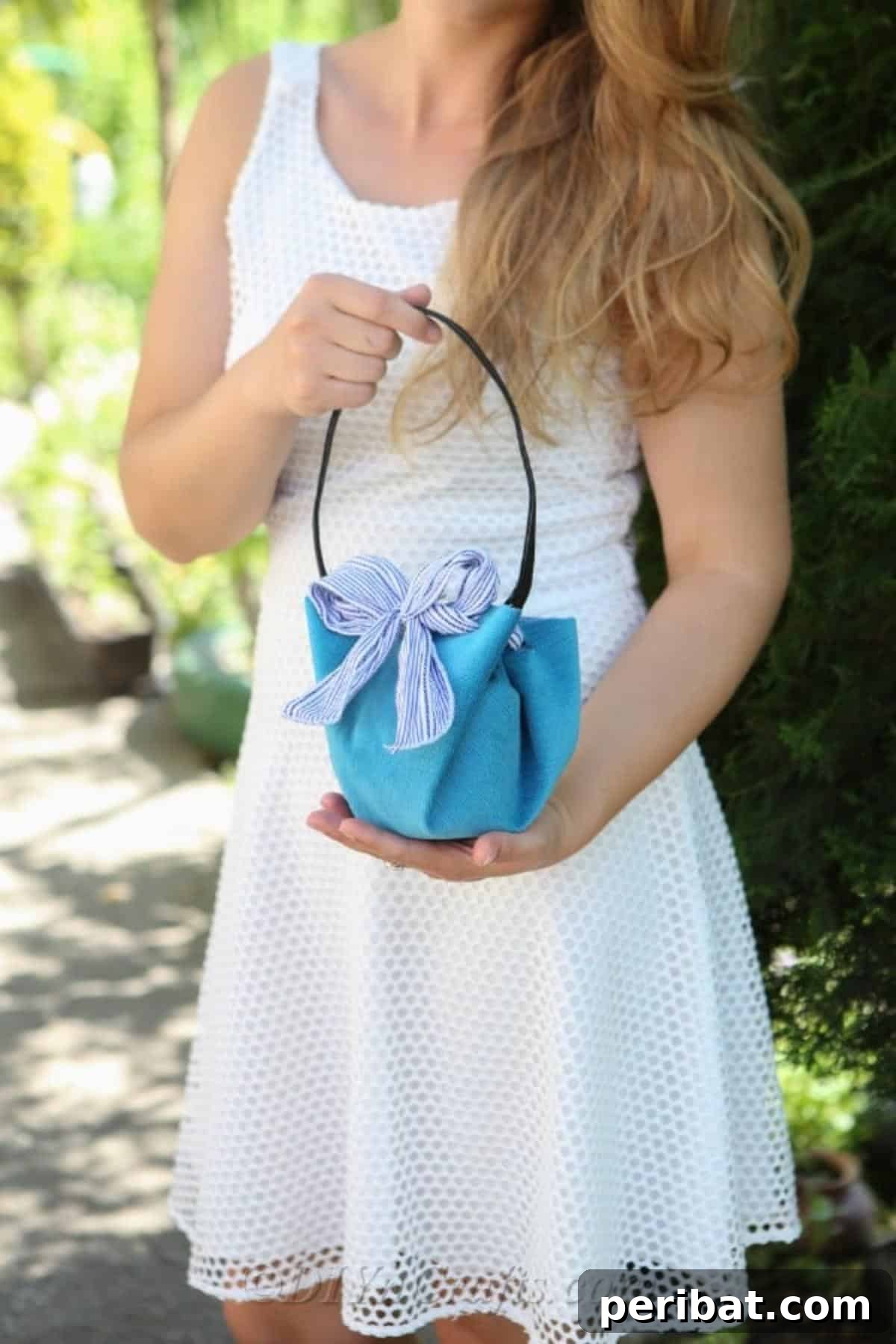 A chic, no-sew handbag created using fabric glue, demonstrating an easy and creative DIY approach to accessory making.