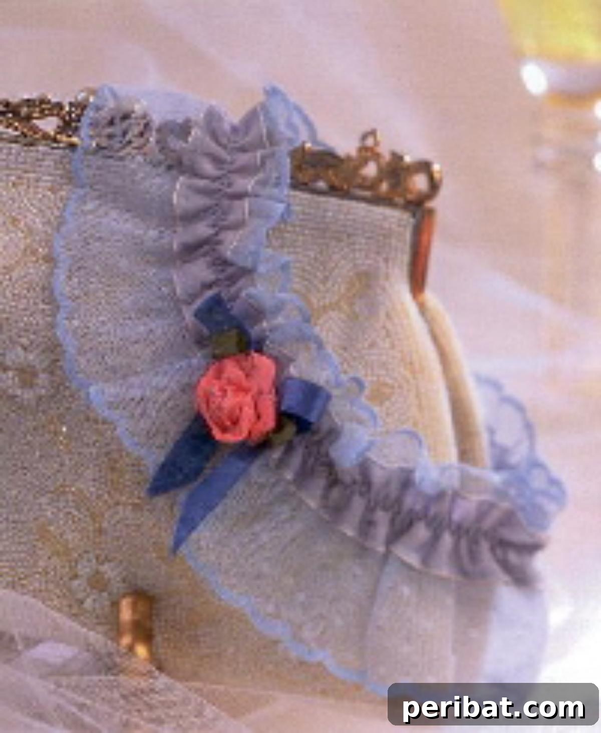 Craft Your Dream Wedding: 20 DIY Accessory Ideas 12 A delicate DIY 'something blue' bridal garter made with white lace and a pale blue satin ribbon bow, embodying tradition and elegance.