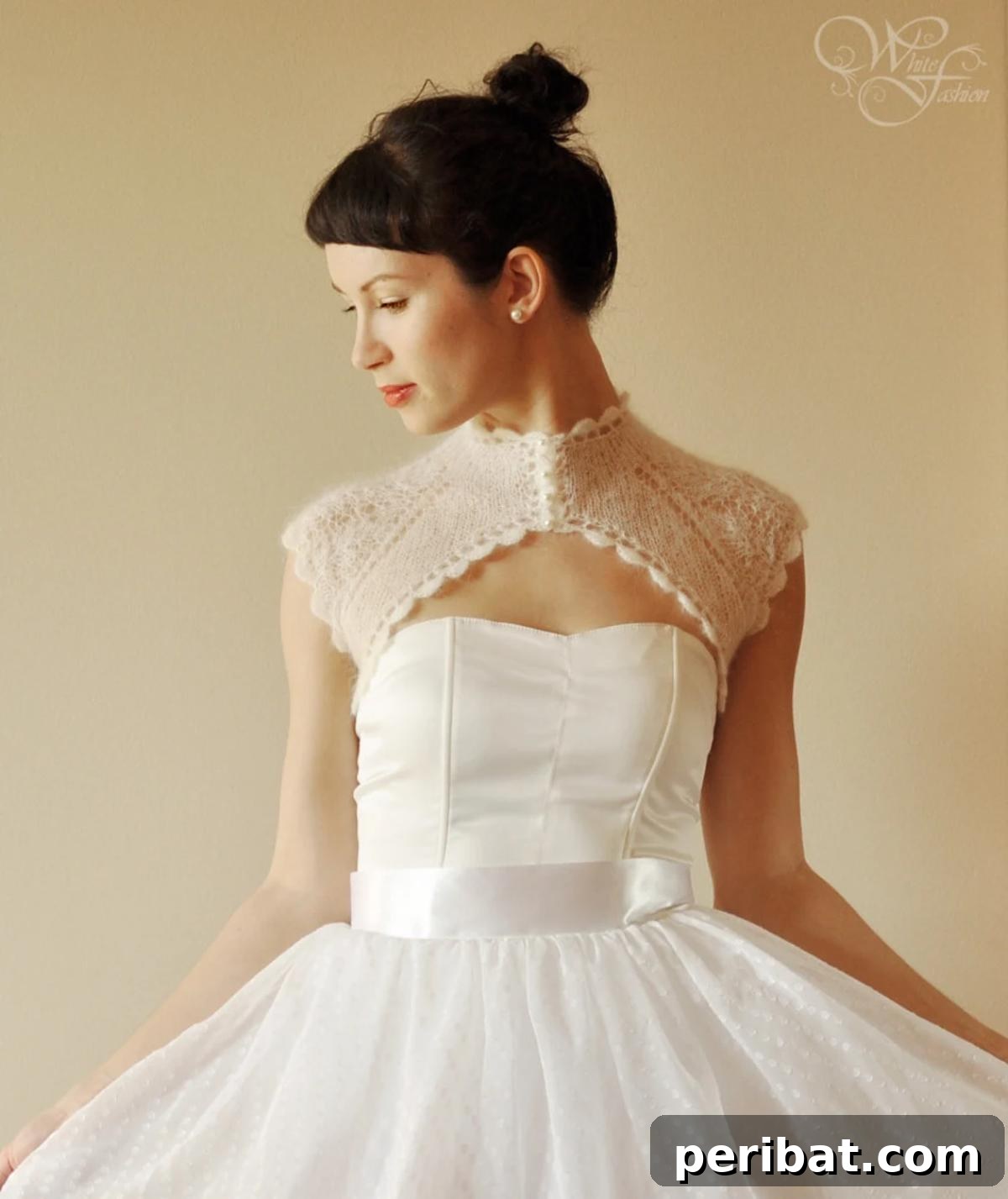 Craft Your Dream Wedding: 20 DIY Accessory Ideas 18 A beautifully knitted elegant lace shrug for a bride, featuring delicate lace sleeves and a sophisticated design, perfect for adding warmth and style.