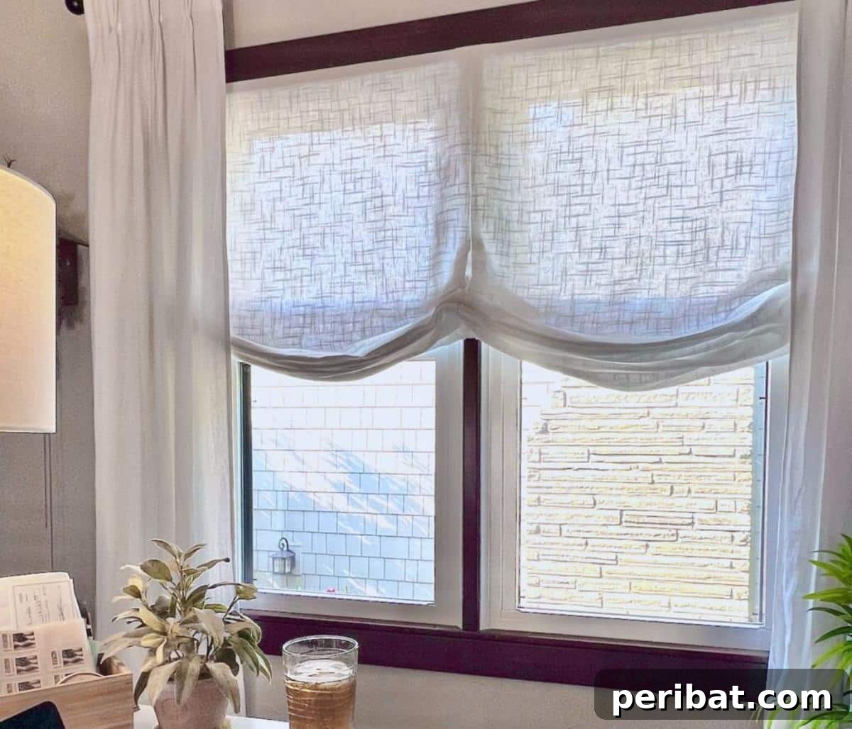 20 Clever DIY Roman Shade Ideas 13 DIY Soft Fold Roman Shade, demonstrating a gentle, flowing look.