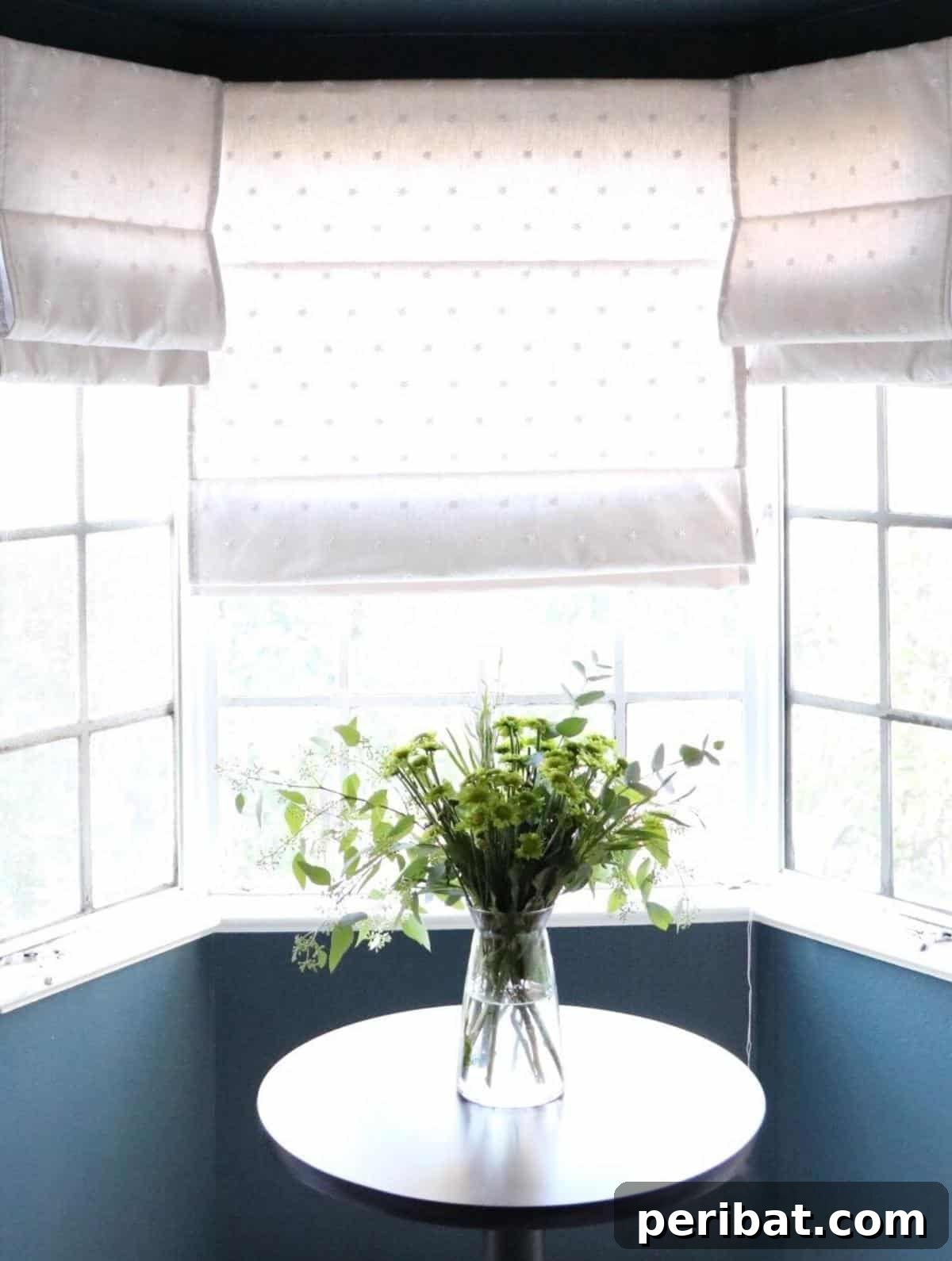 20 Clever DIY Roman Shade Ideas 14 DIY Roman Shades for a Bay Window, showcasing a tailored fit.