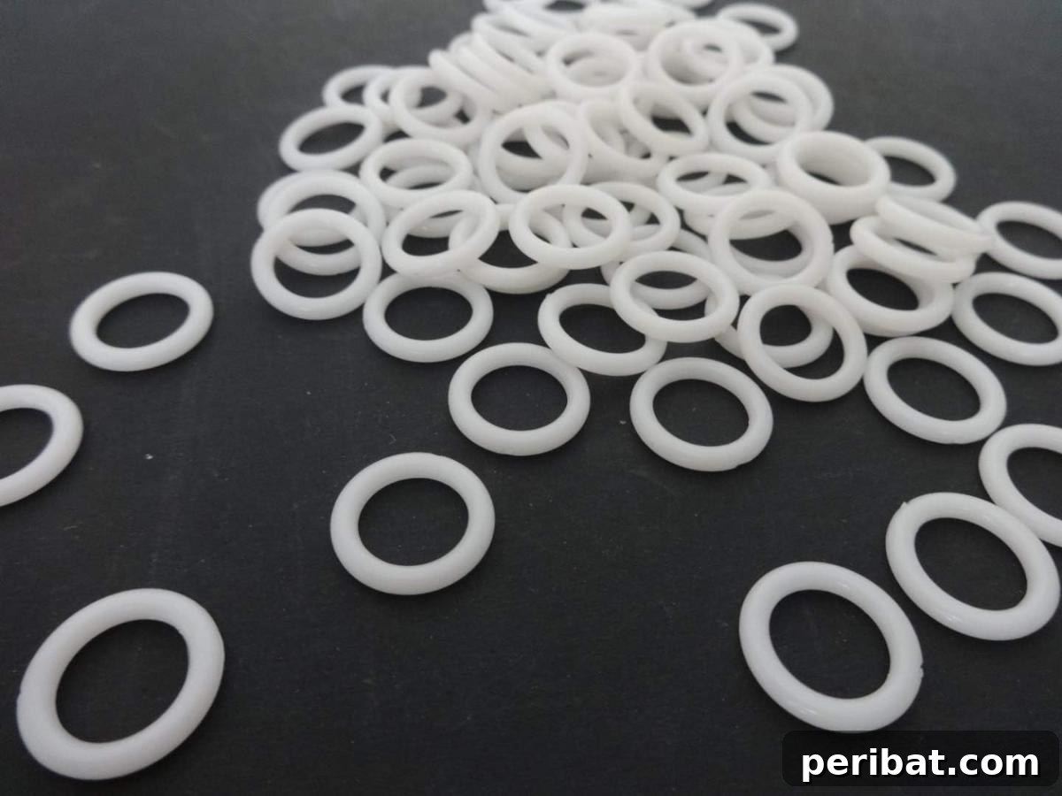 20 Clever DIY Roman Shade Ideas 21 Drapery DIY White Plastic Rings for Roman Shades, essential for function.