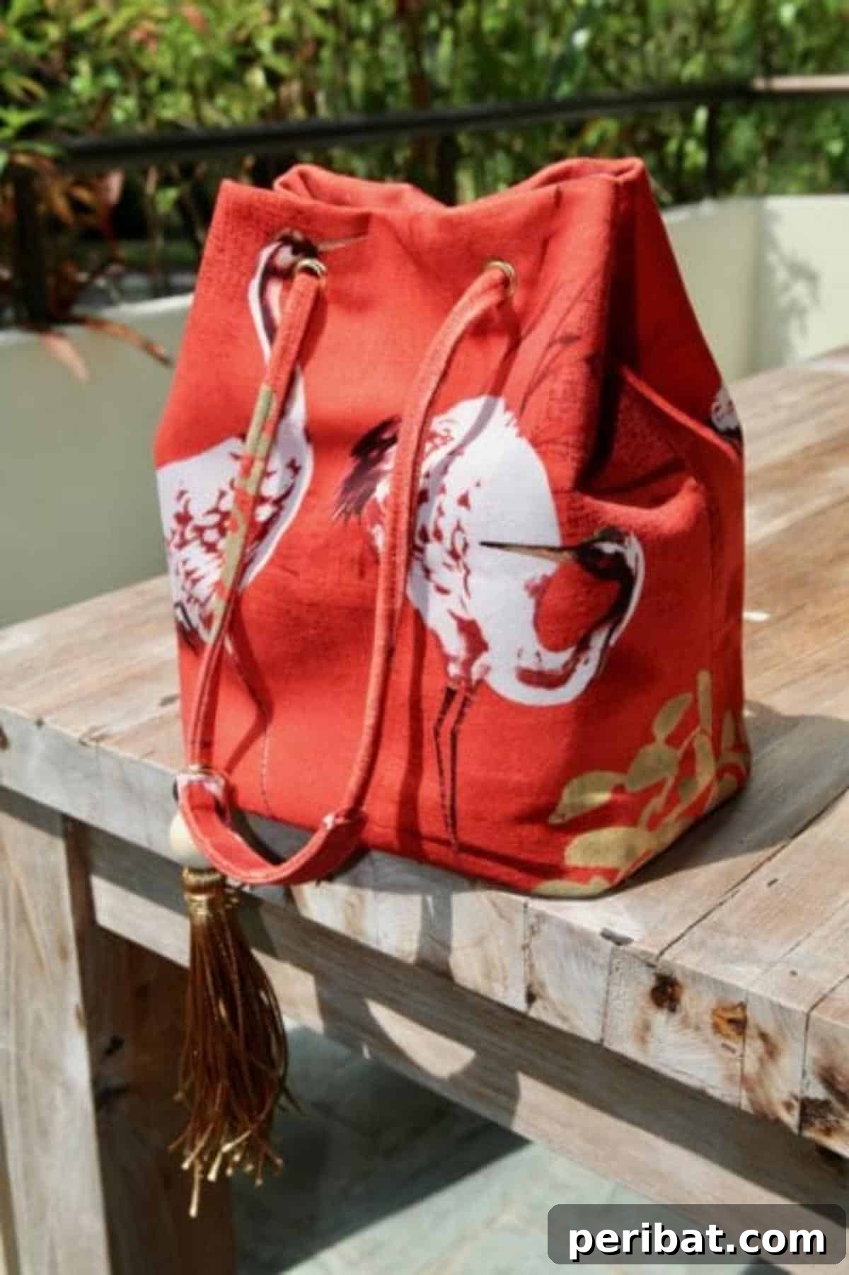 Unlock Your Creativity: 38 Beginner Sewing Projects 4 Stylish Easy Bucket Bag Purse made from either fabric or leather, featuring a drawstring closure.