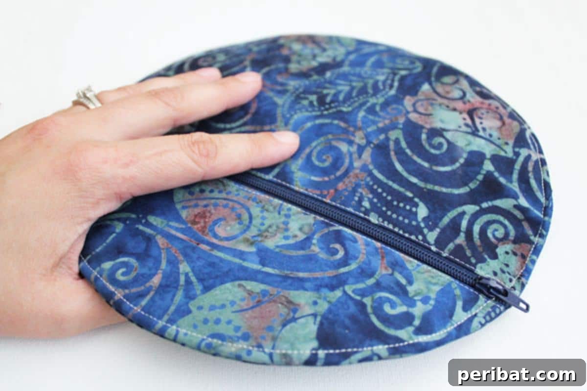 Unlock Your Creativity: 38 Beginner Sewing Projects 34 A chic and Simple Stitched Circle Clutch, perfect for an evening out.