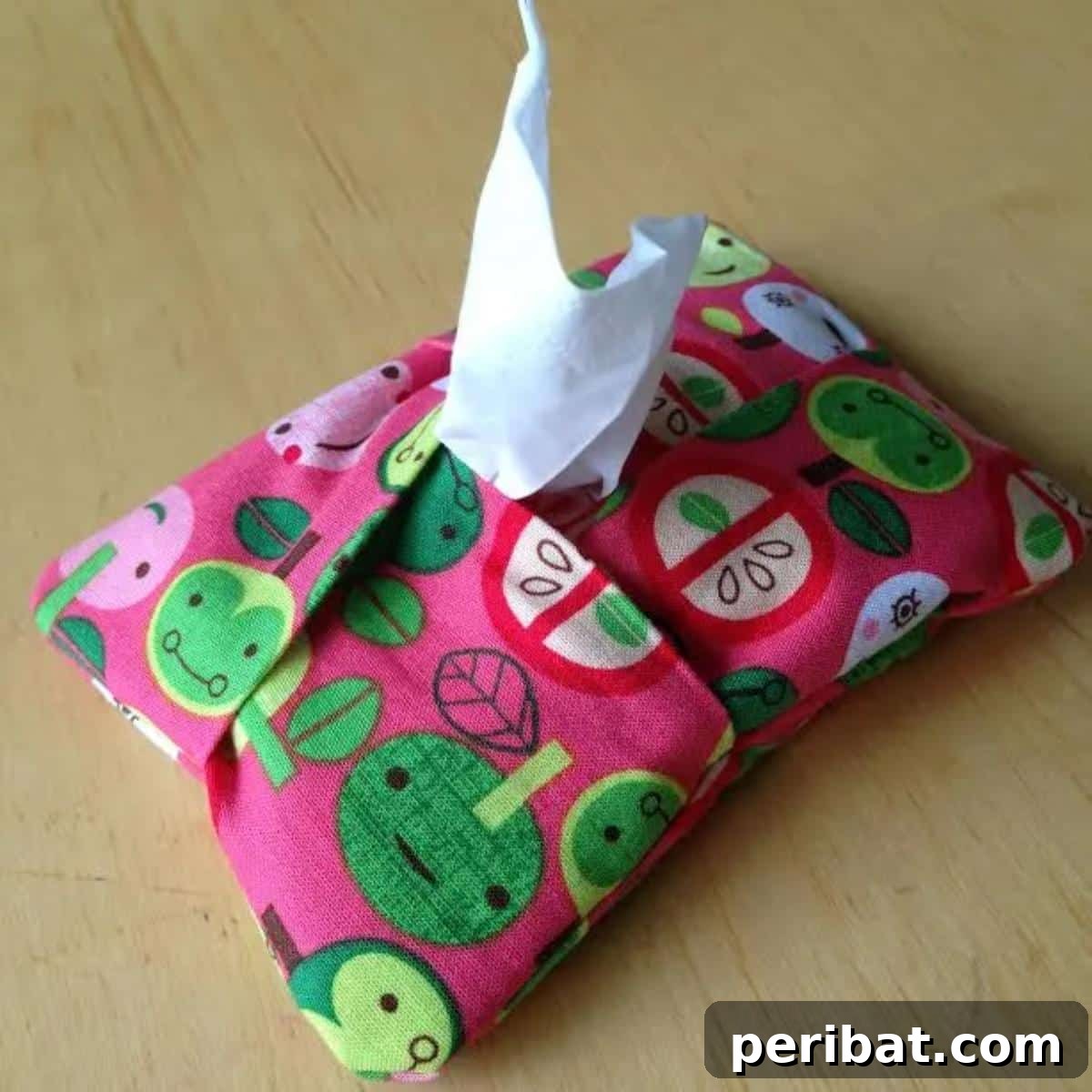 Unlock Your Creativity: 38 Beginner Sewing Projects 36 A compact DIY Kleenex Holder made from patterned fabric.