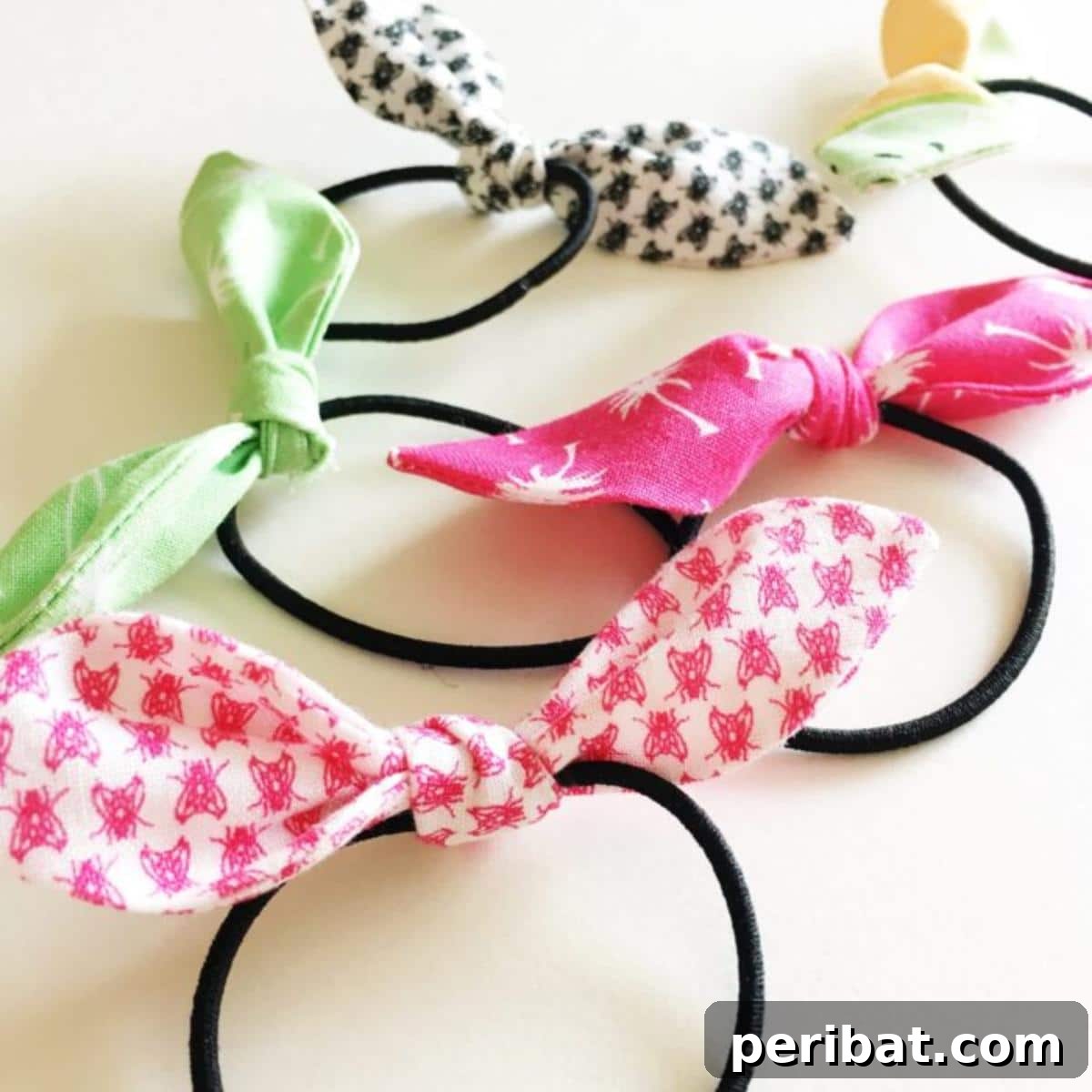 Unlock Your Creativity: 38 Beginner Sewing Projects 6 Close-up of DIY Knotted Hair Ties, made from various elastic fabrics.