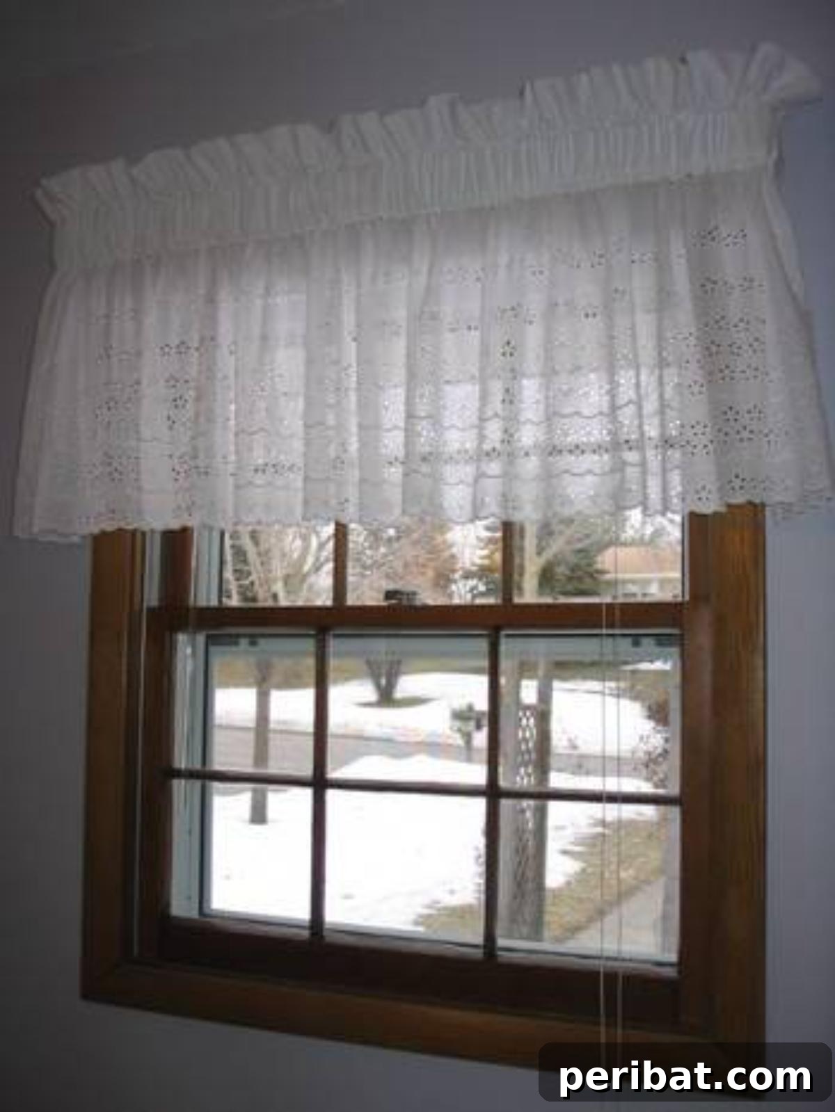 DIY Pocketed Window Topper, adding a decorative accent above a window.