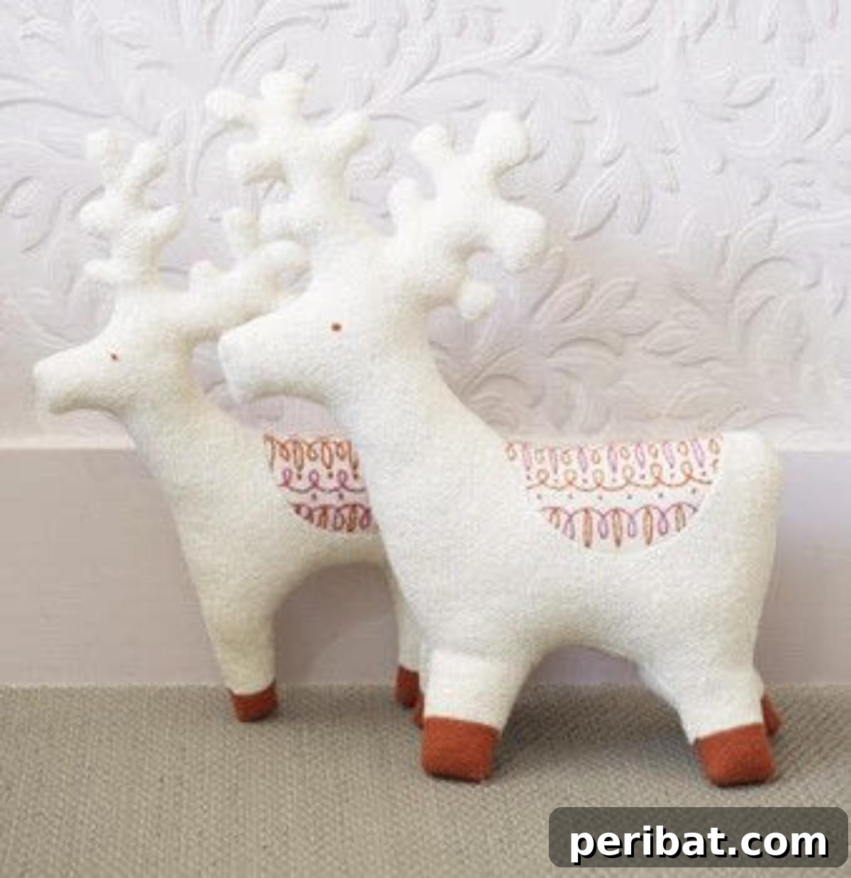 DIY Reindeer Plushies with embroidered details.