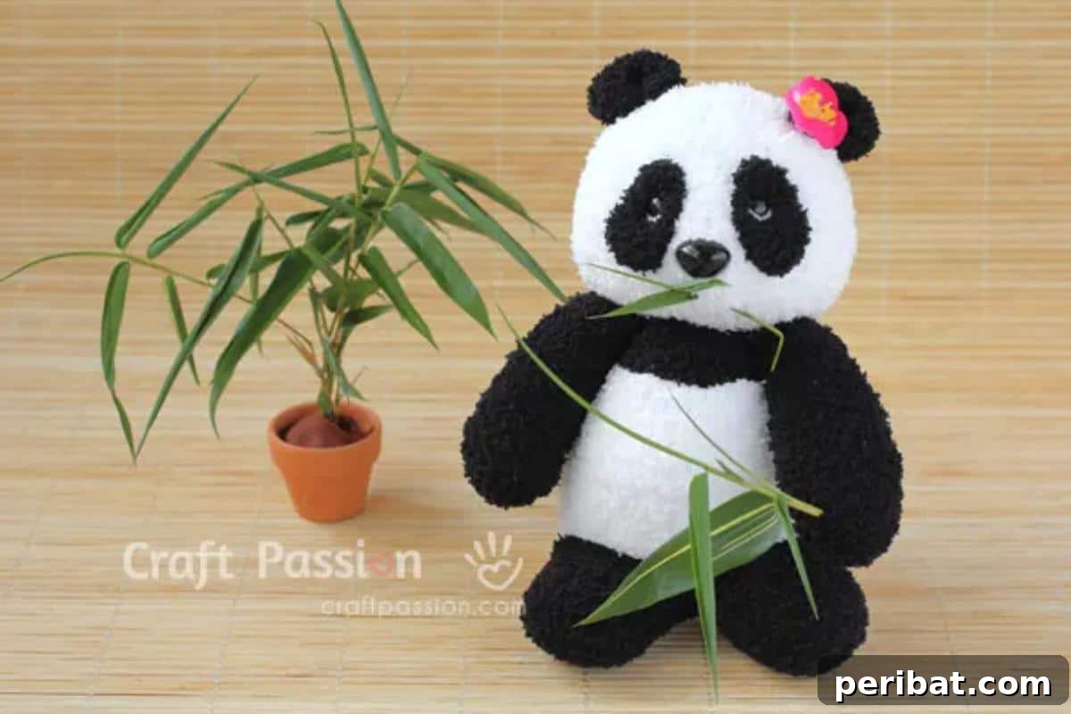 DIY Sock Panda plushie made from black and white chenille socks.
